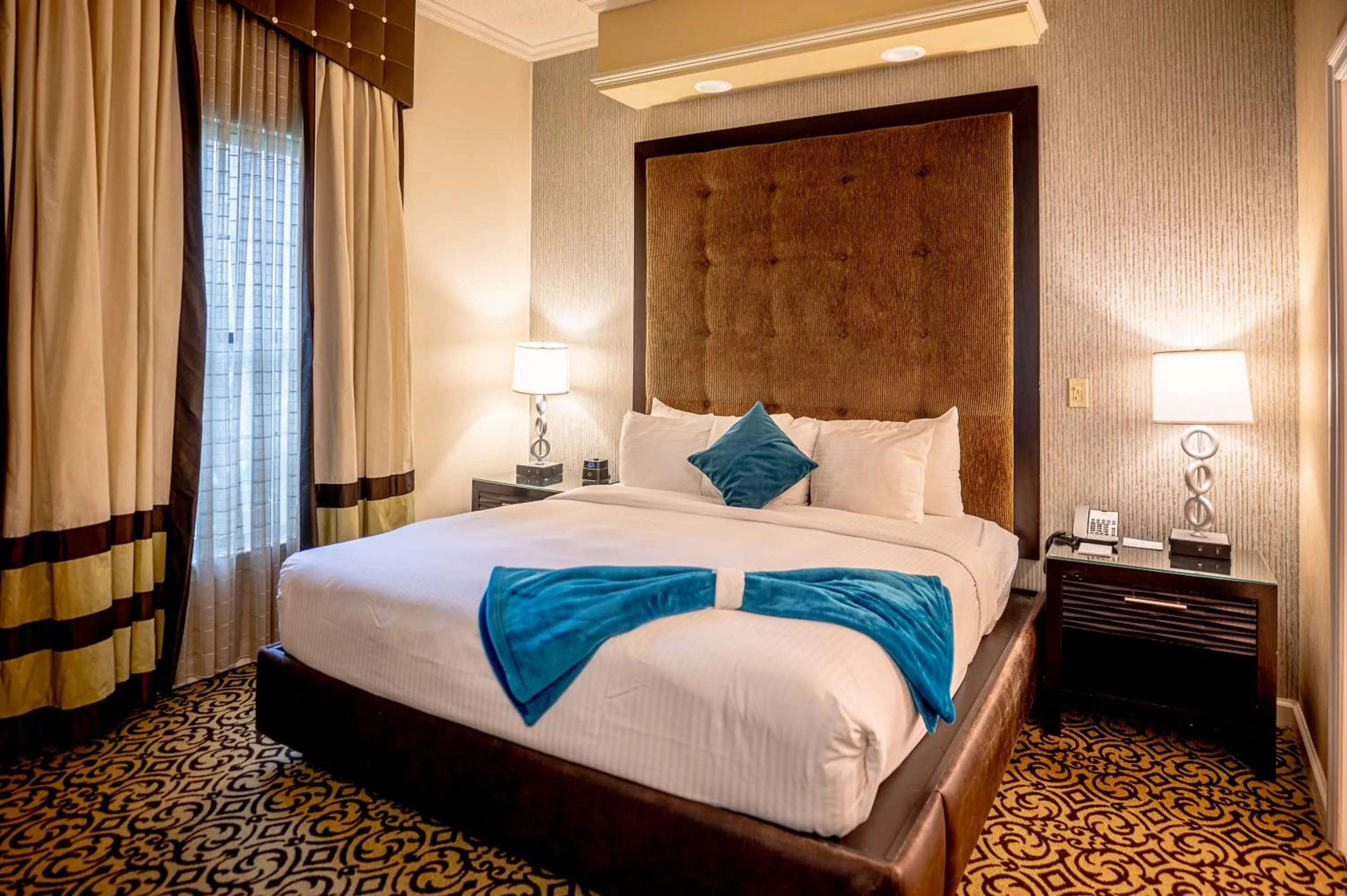 Bed in The Inn At Fox Hollow Hotel