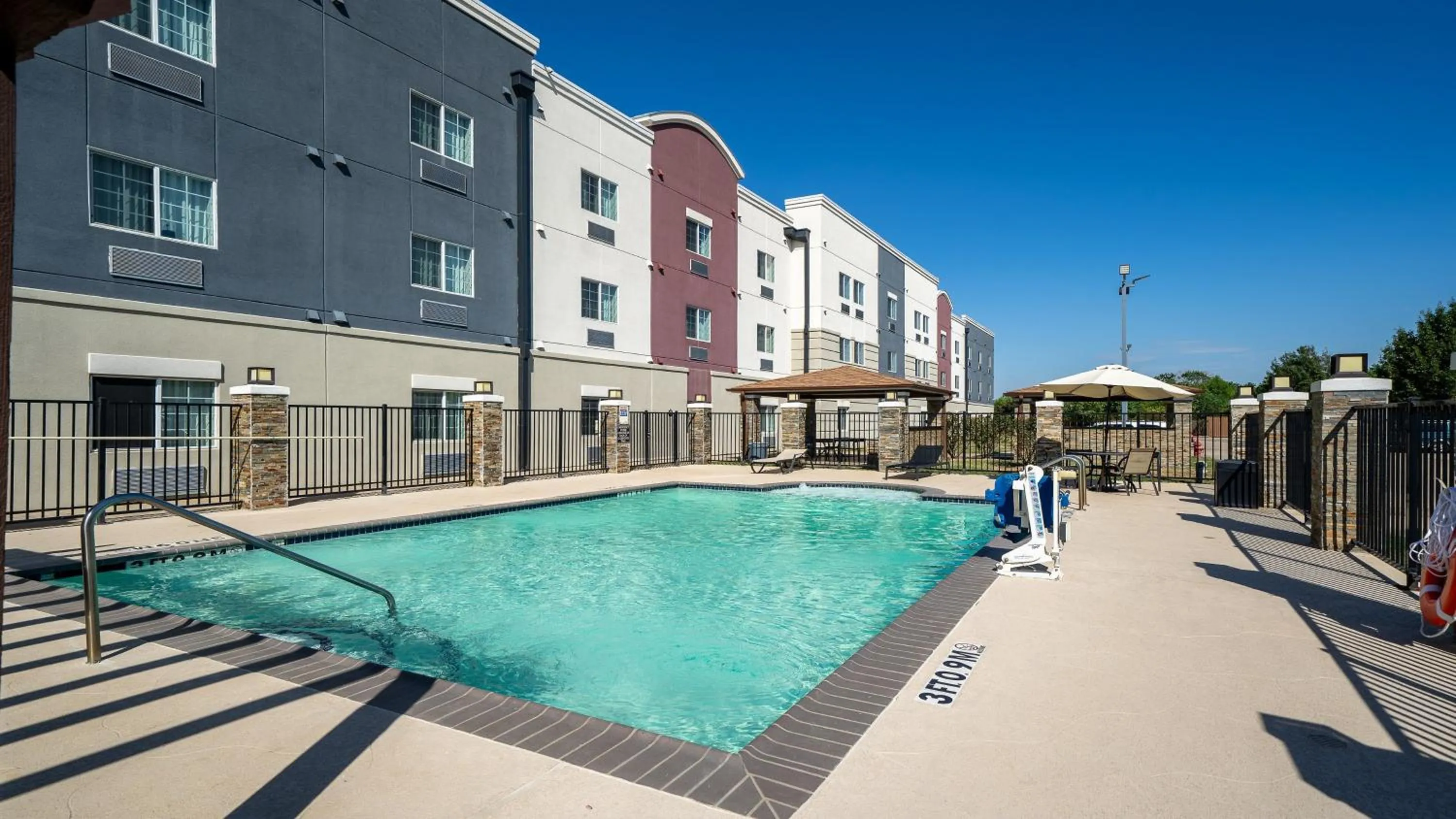 Swimming pool in Candlewood Suites Baytown by IHG
