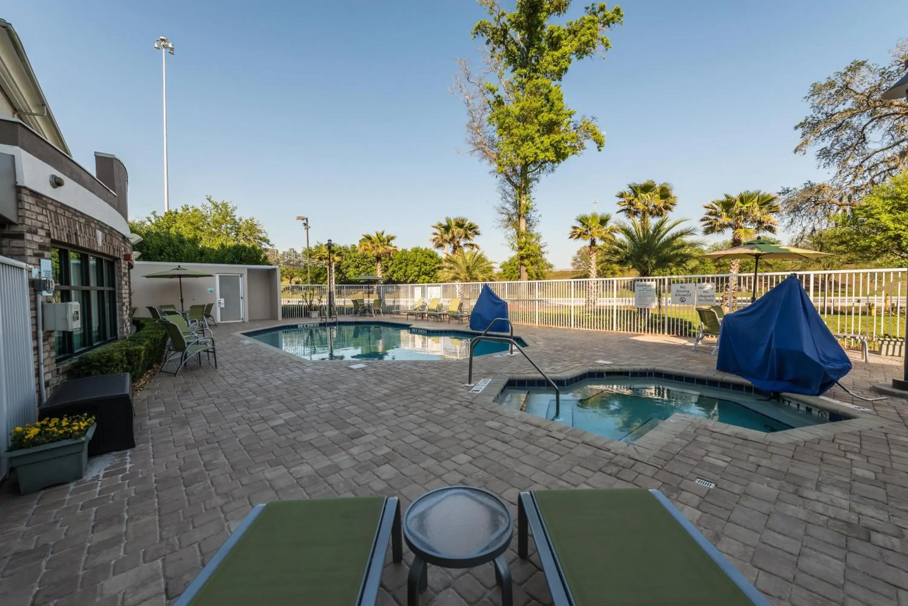 Swimming pool in Holiday Inn Express Hotel & Suites Jacksonville-Blount Island by IHG Swimming pool in Holiday Inn Express Hotel & Suites Jacksonville-Blount Island by IHG