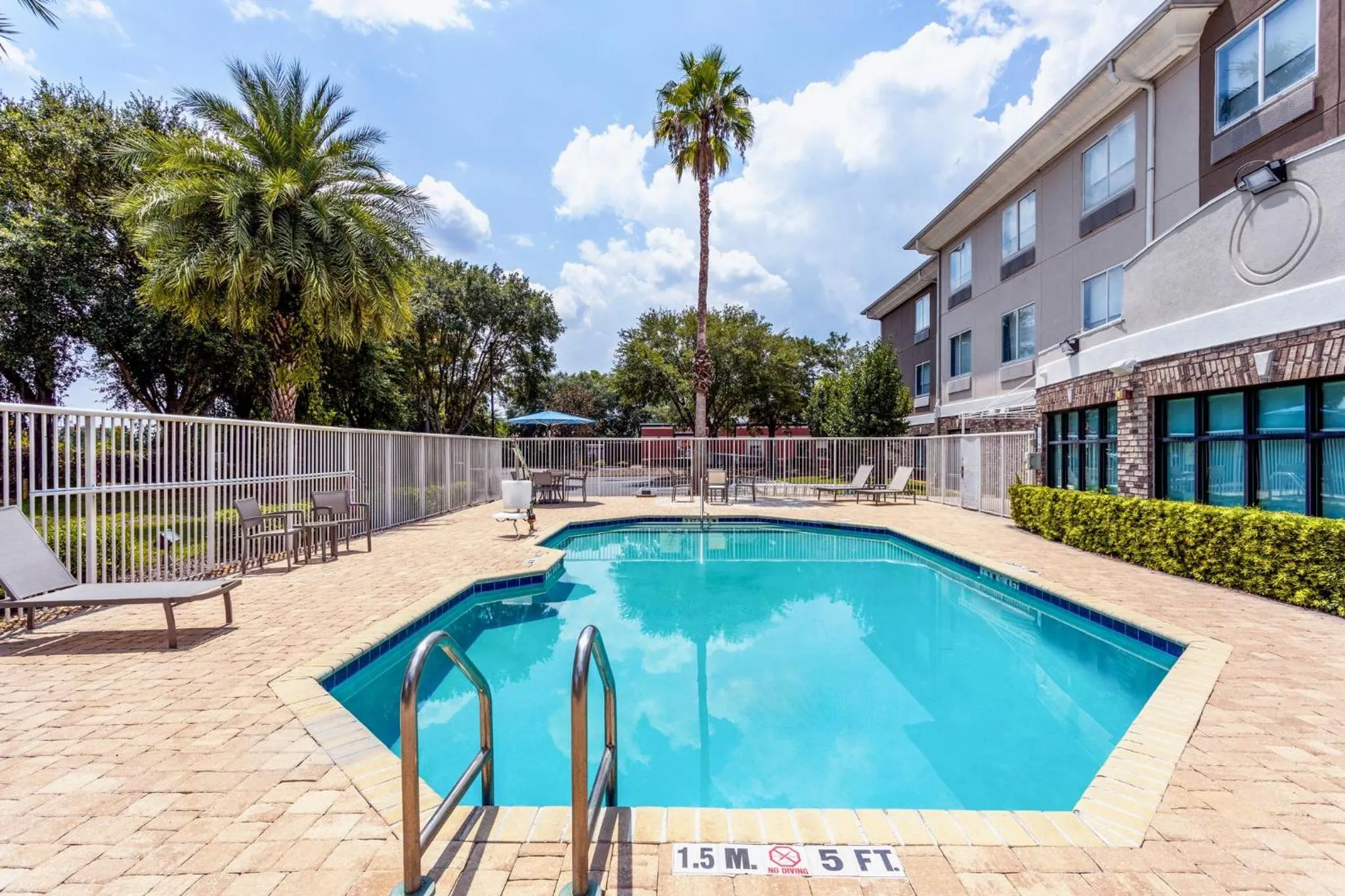 Swimming pool in Holiday Inn Express Hotel & Suites Jacksonville-Blount Island by IHG
