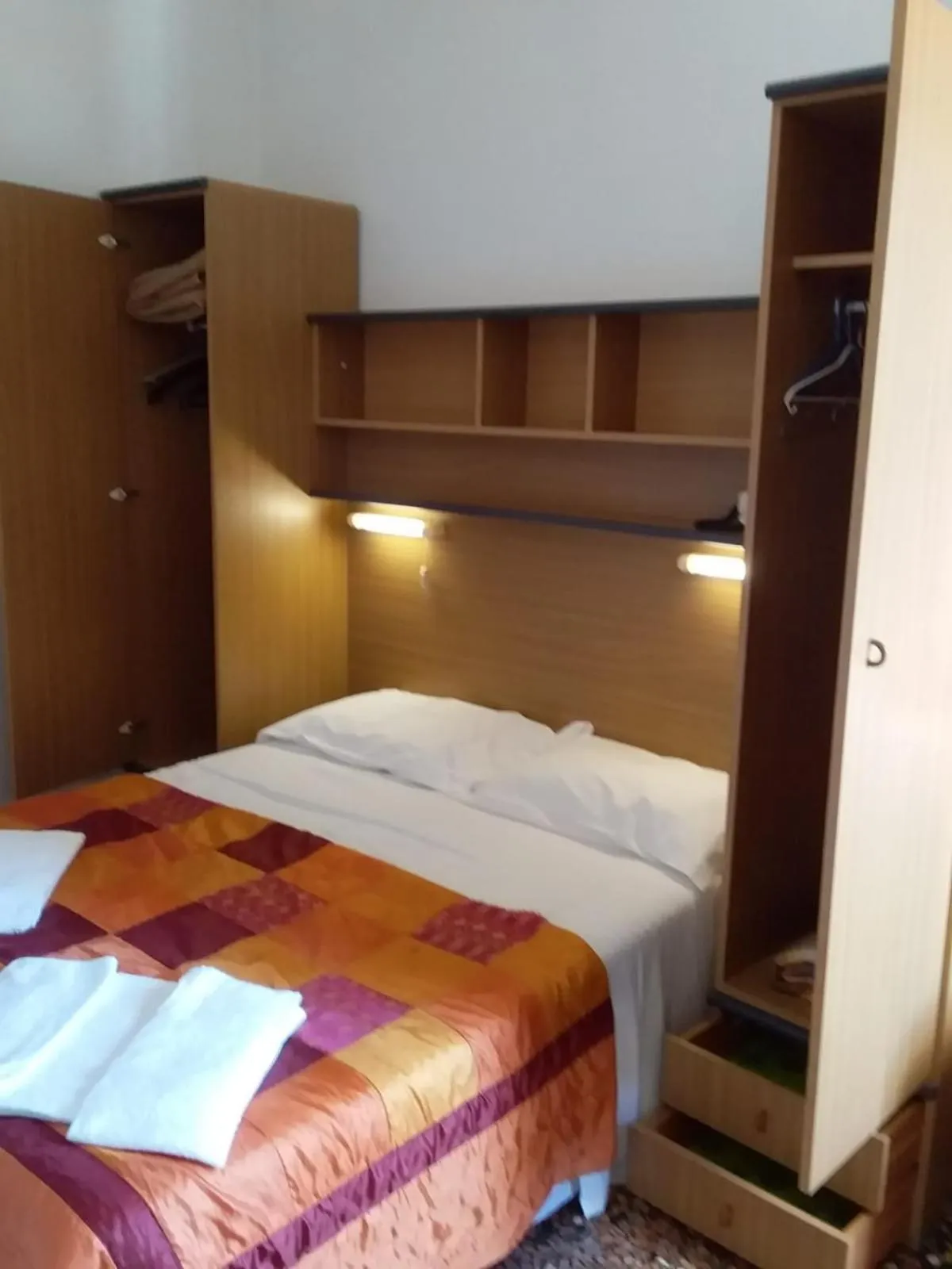 Bedroom in Hotel Gino