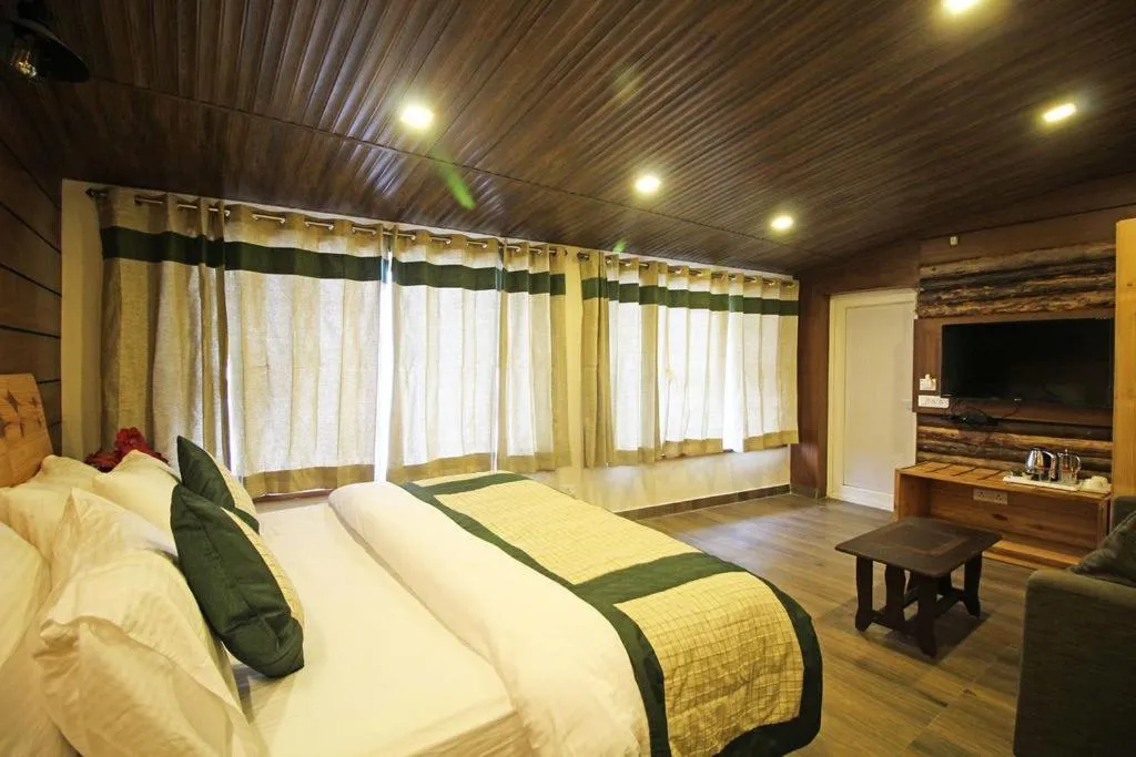 Photo of the whole room, Bed in Jharipani Castle