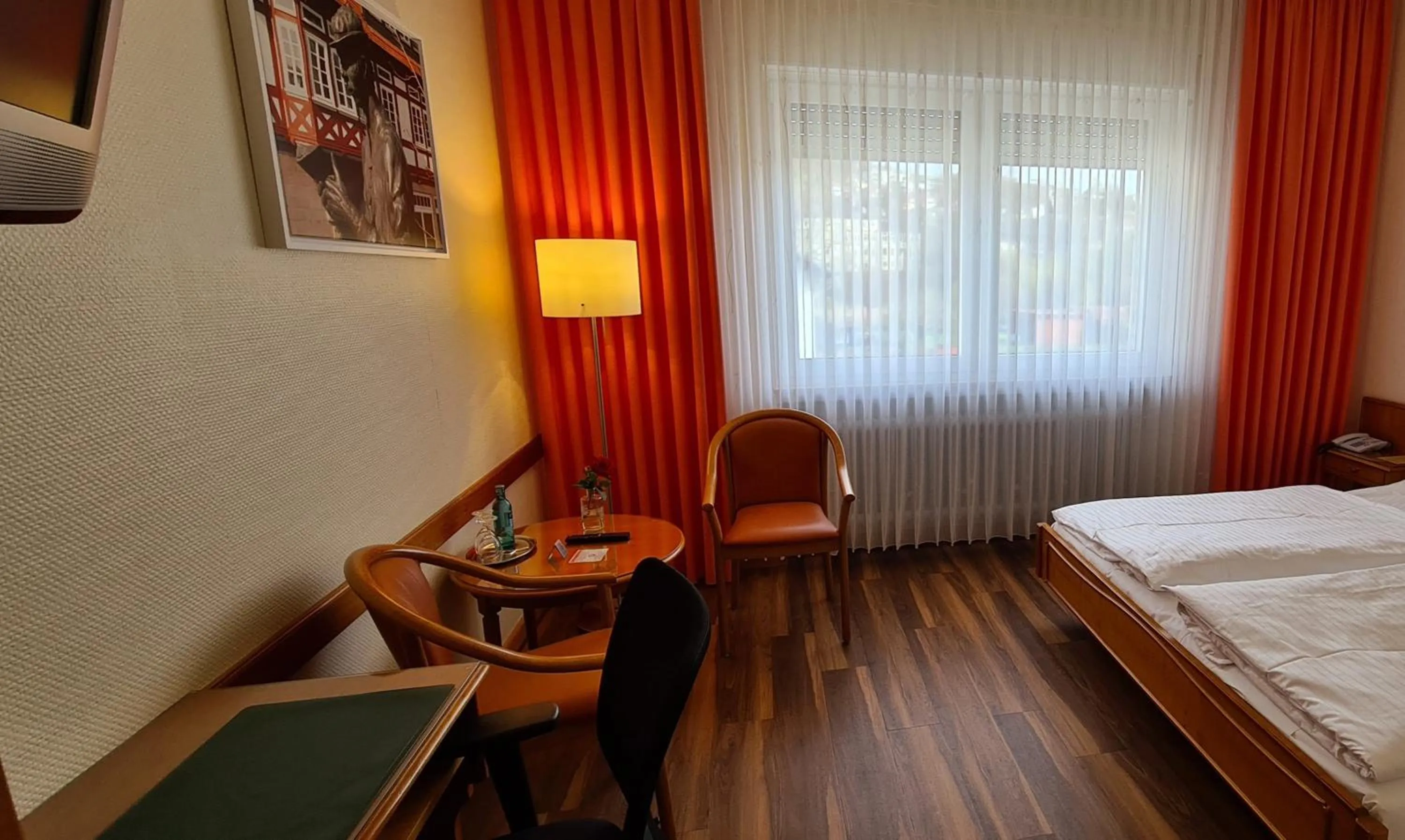 Photo of the whole room, Bed in Hotel Hessischer Hof
