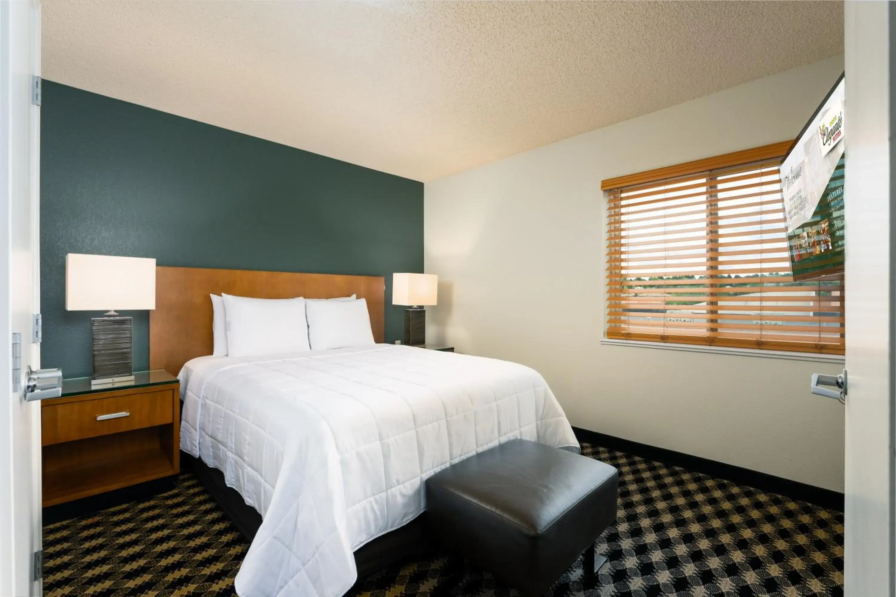 Bed in MCM Elegante Suites Bed in MCM Elegante Suites