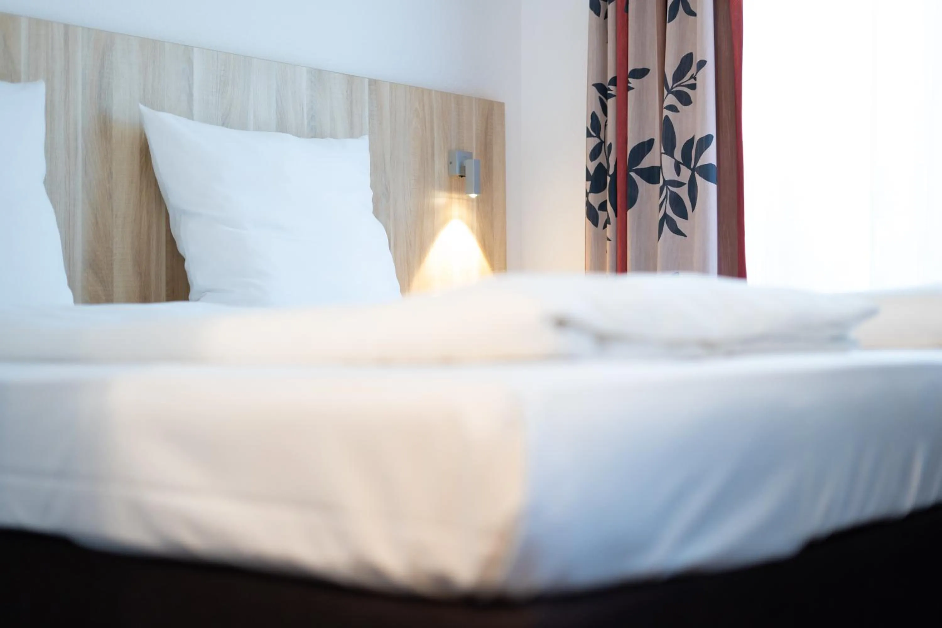 Photo of the whole room, Bed in Taste Smart Hotel Backnang