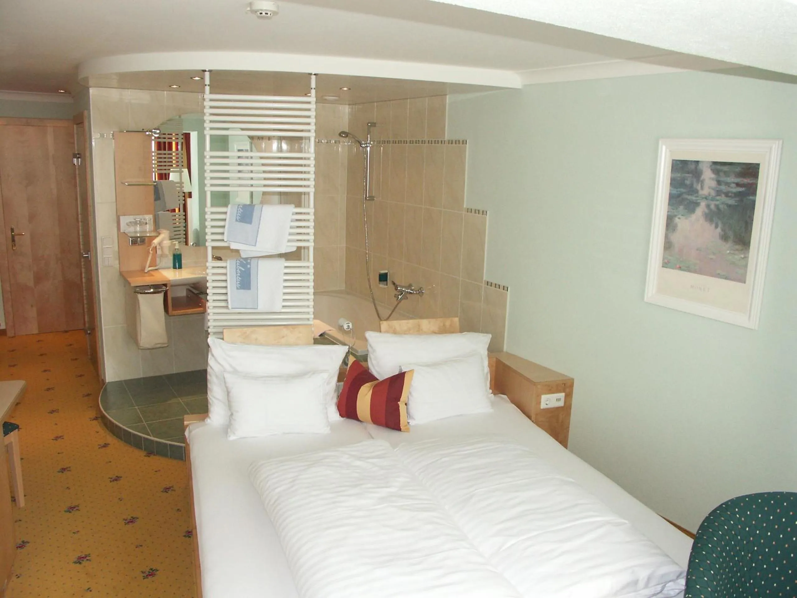 Photo of the whole room, Bed in Hotel Alpina nature-wellness
