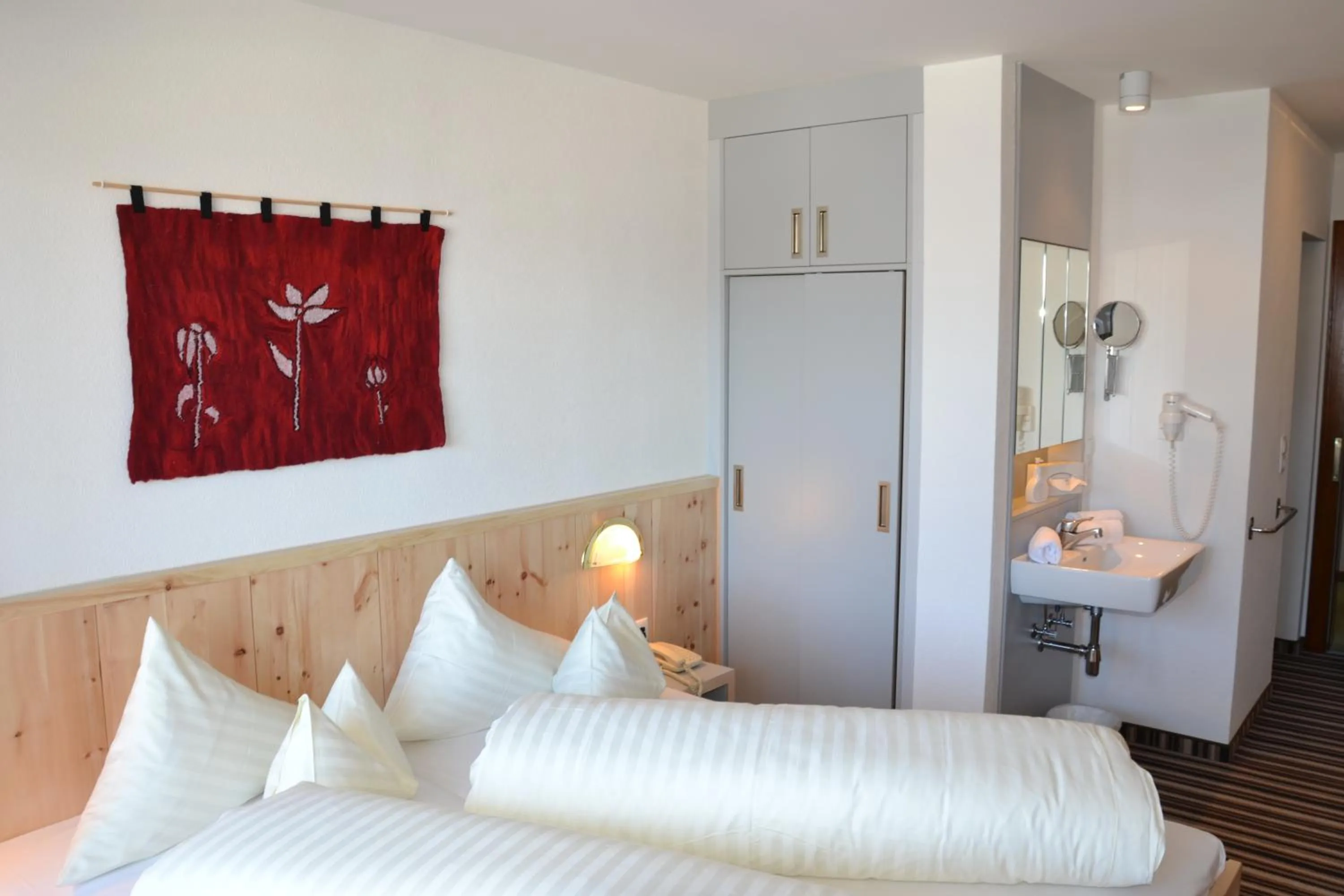 Photo of the whole room, Bed in Hotel Alpina nature-wellness