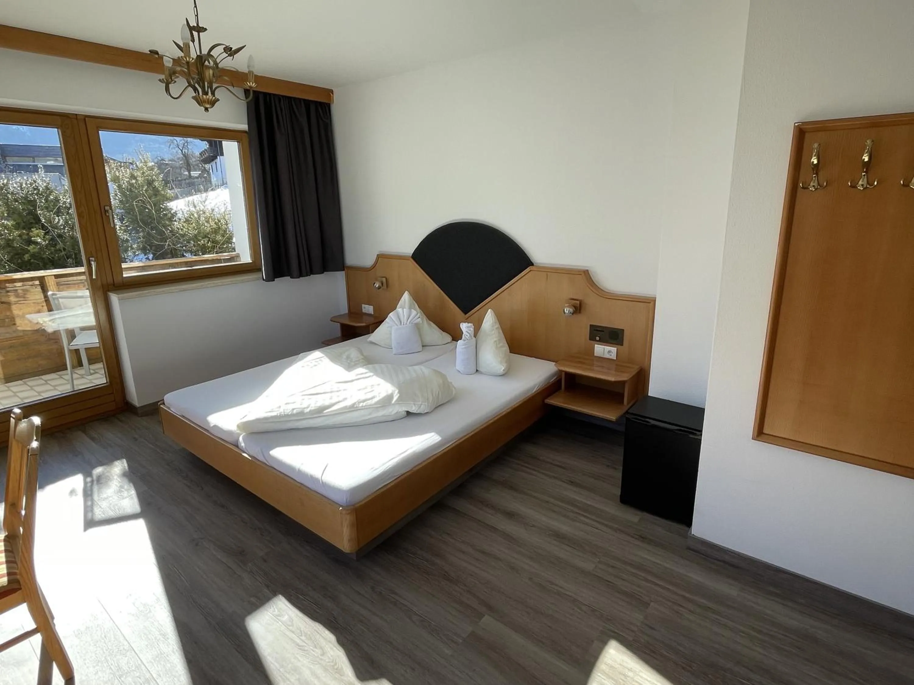 Bedroom, Bed in Hotel Alpina nature-wellness