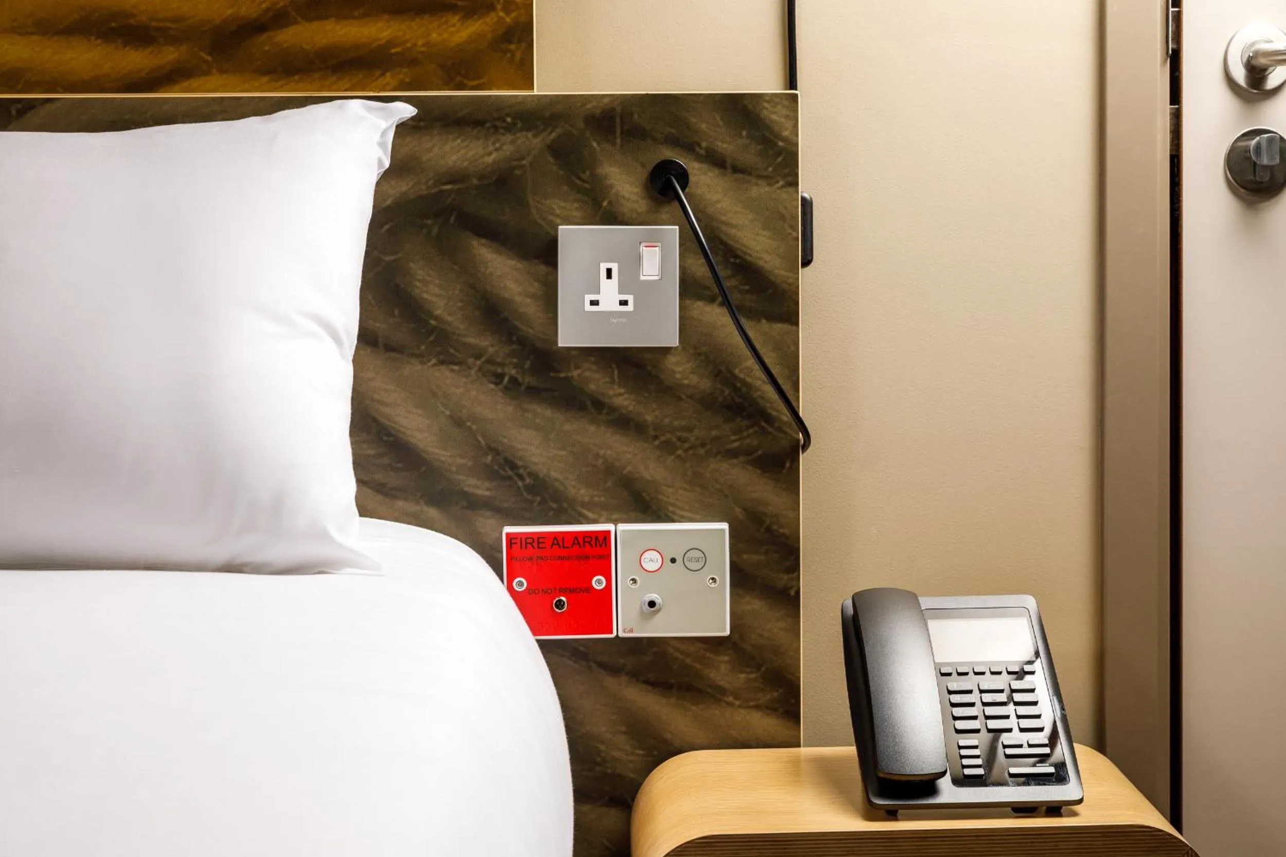 Bed in ibis Cambridge Central Station