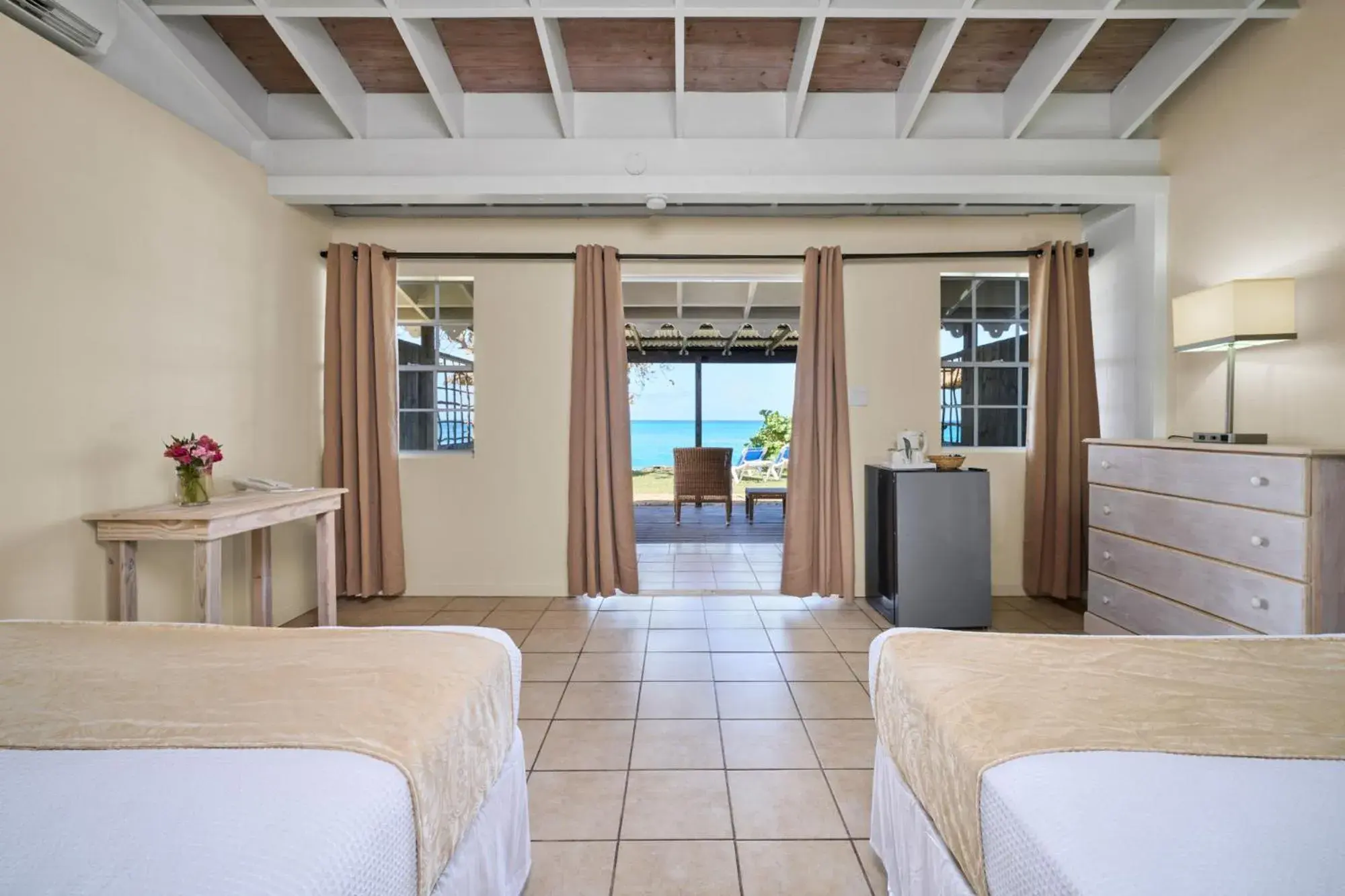 Bed in Hawksbill Resort Antigua - All Inclusive Bed in Hawksbill Resort Antigua - All Inclusive