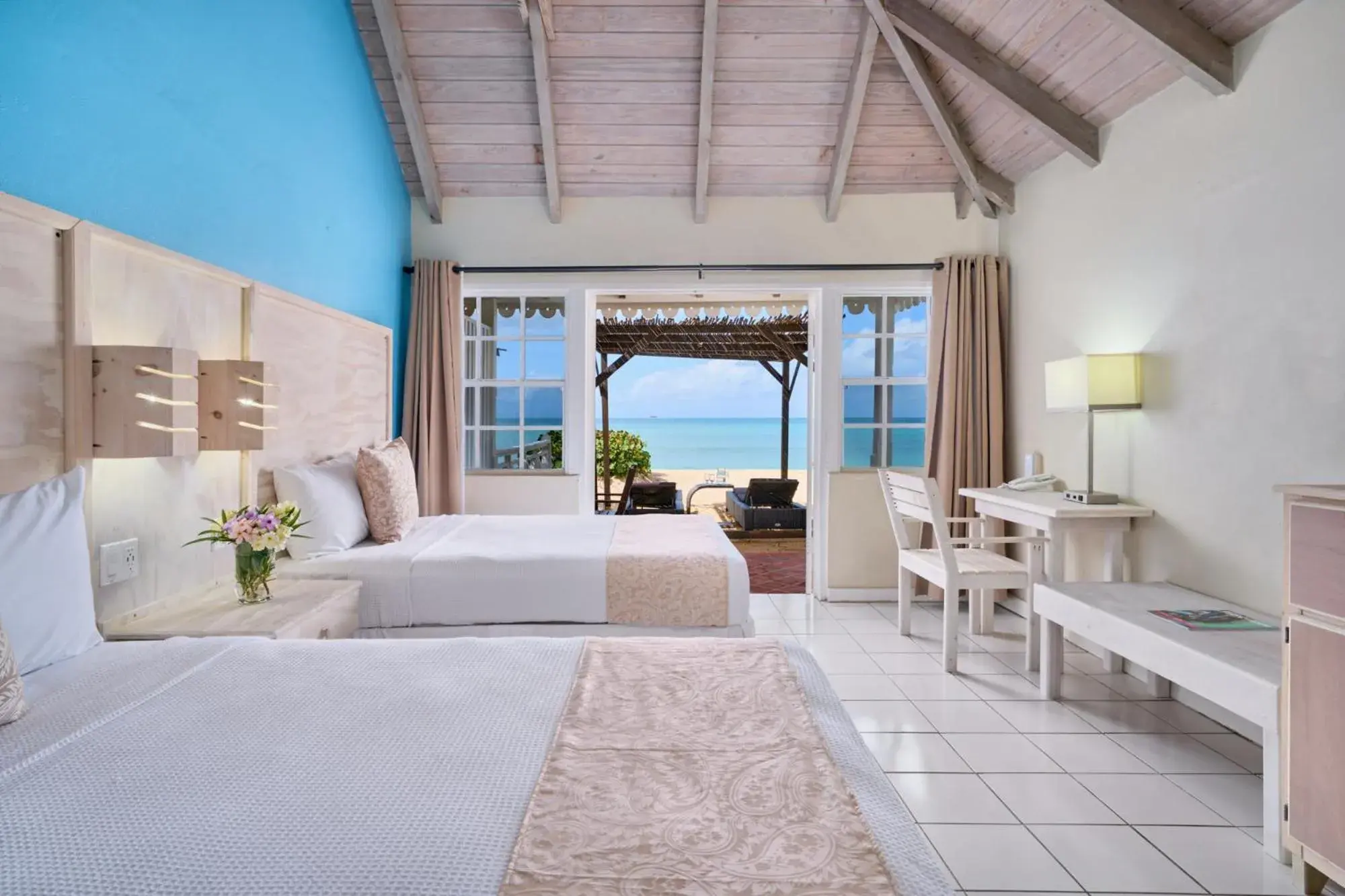 Royal Palm Beach Room (2 Doubles) in Hawksbill Resort Antigua - All Inclusive Royal Palm Beach Room (2 Doubles) in Hawksbill Resort Antigua - All Inclusive