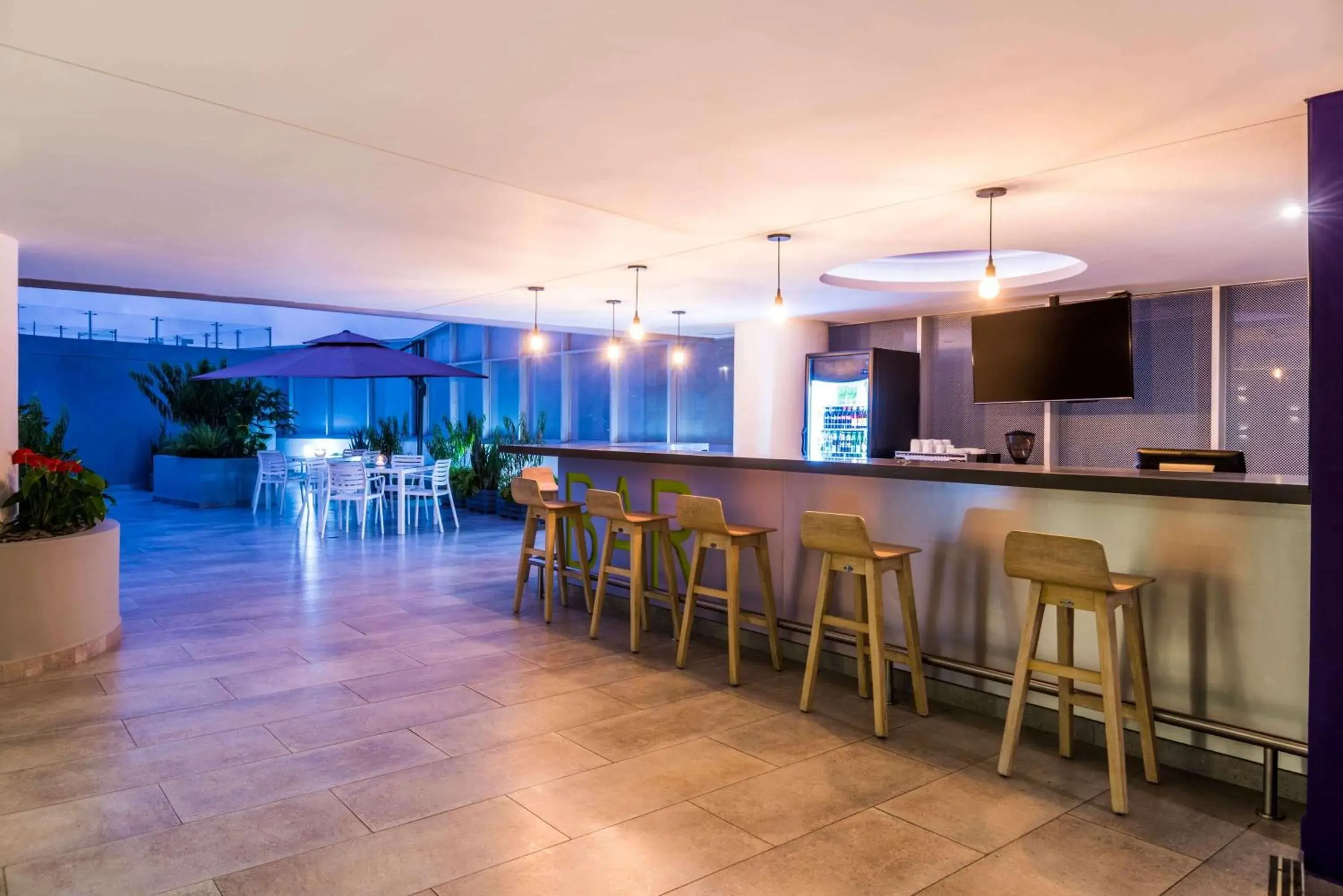 Lounge or bar in La Quinta by Wyndham Medellin Lounge or bar in La Quinta by Wyndham Medellin