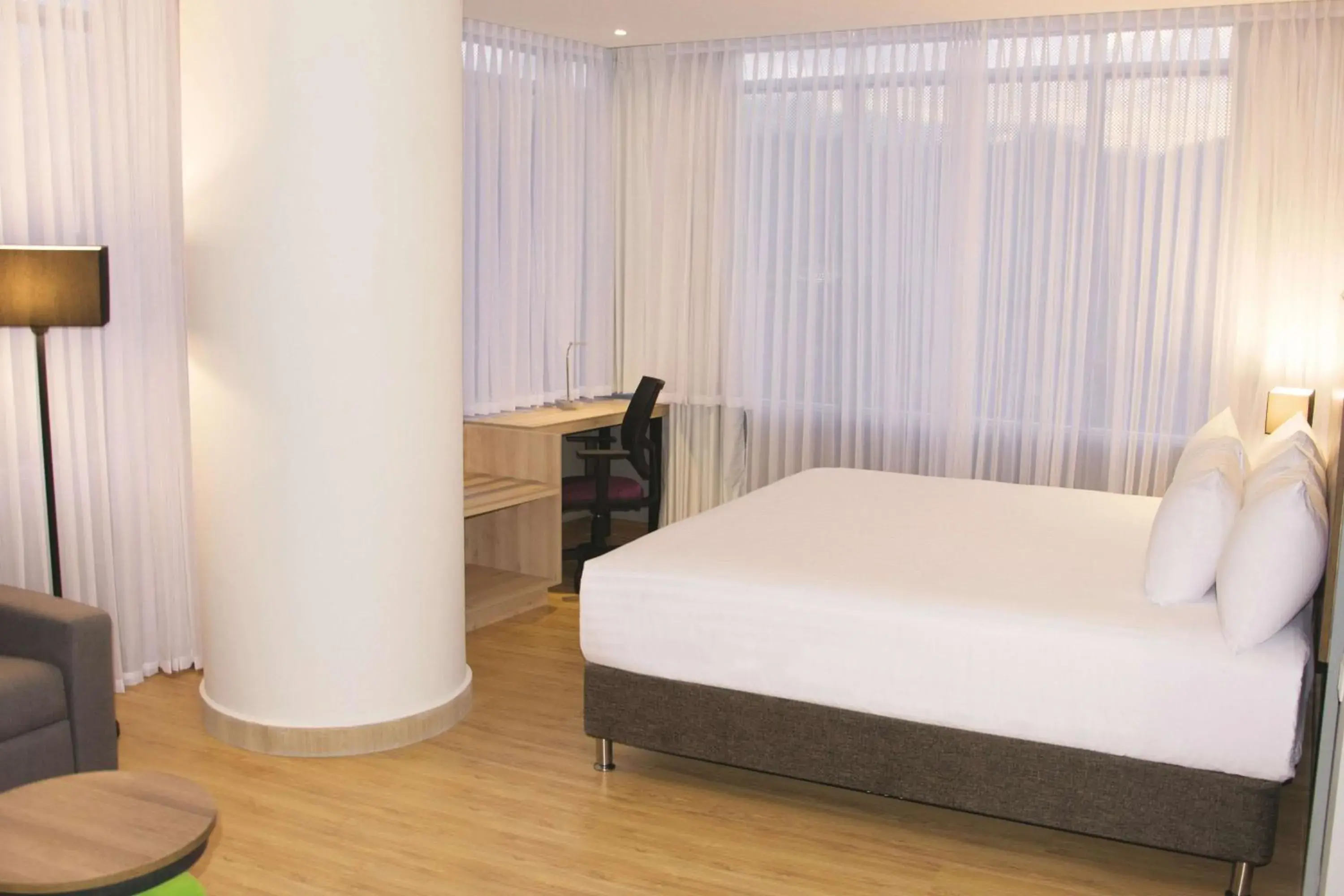 Photo of the whole room, Bed in La Quinta by Wyndham Medellin Photo of the whole room, Bed in La Quinta by Wyndham Medellin