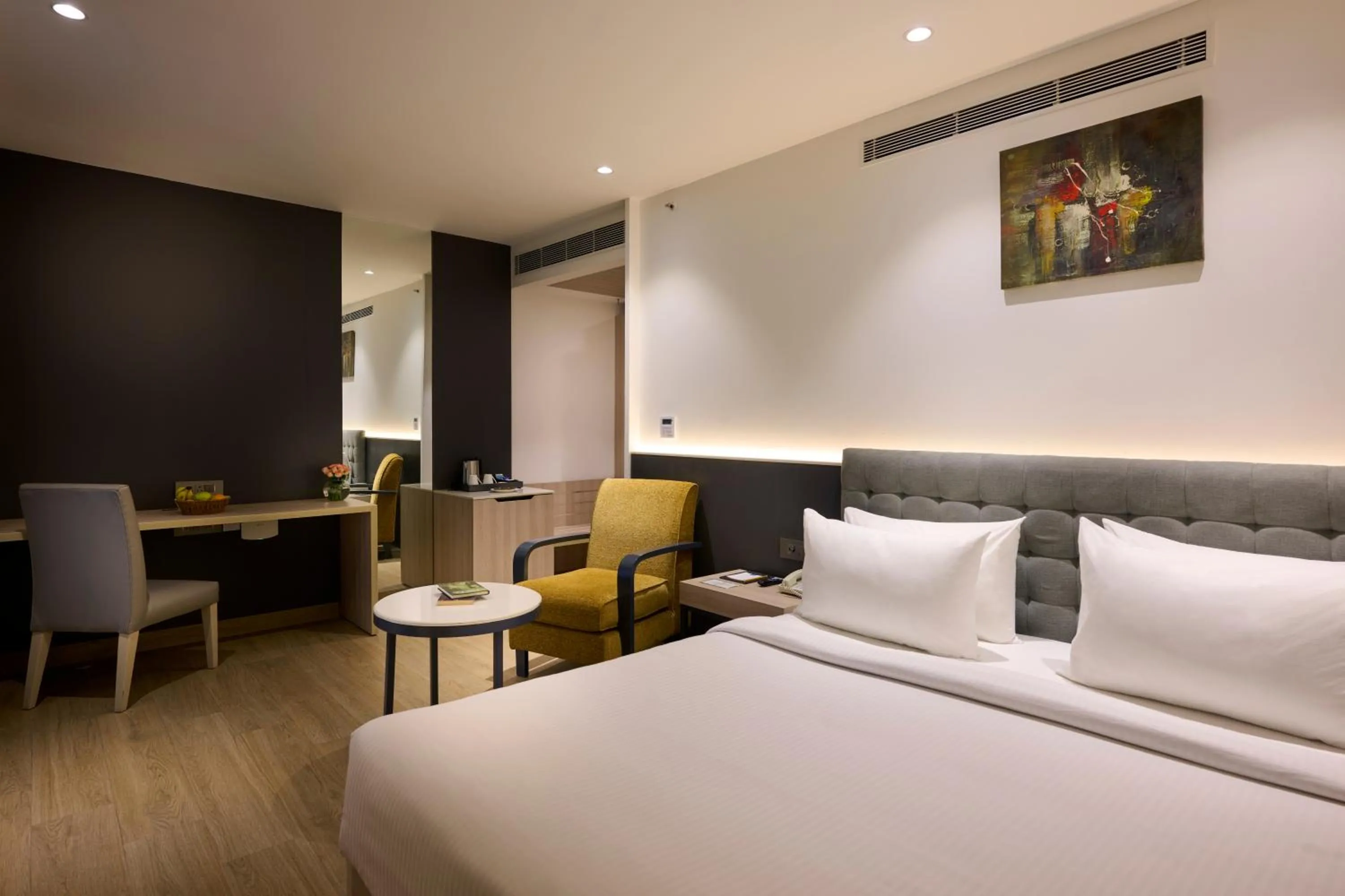 Bedroom, Bed in Delite Sarovar Portico Faridabad