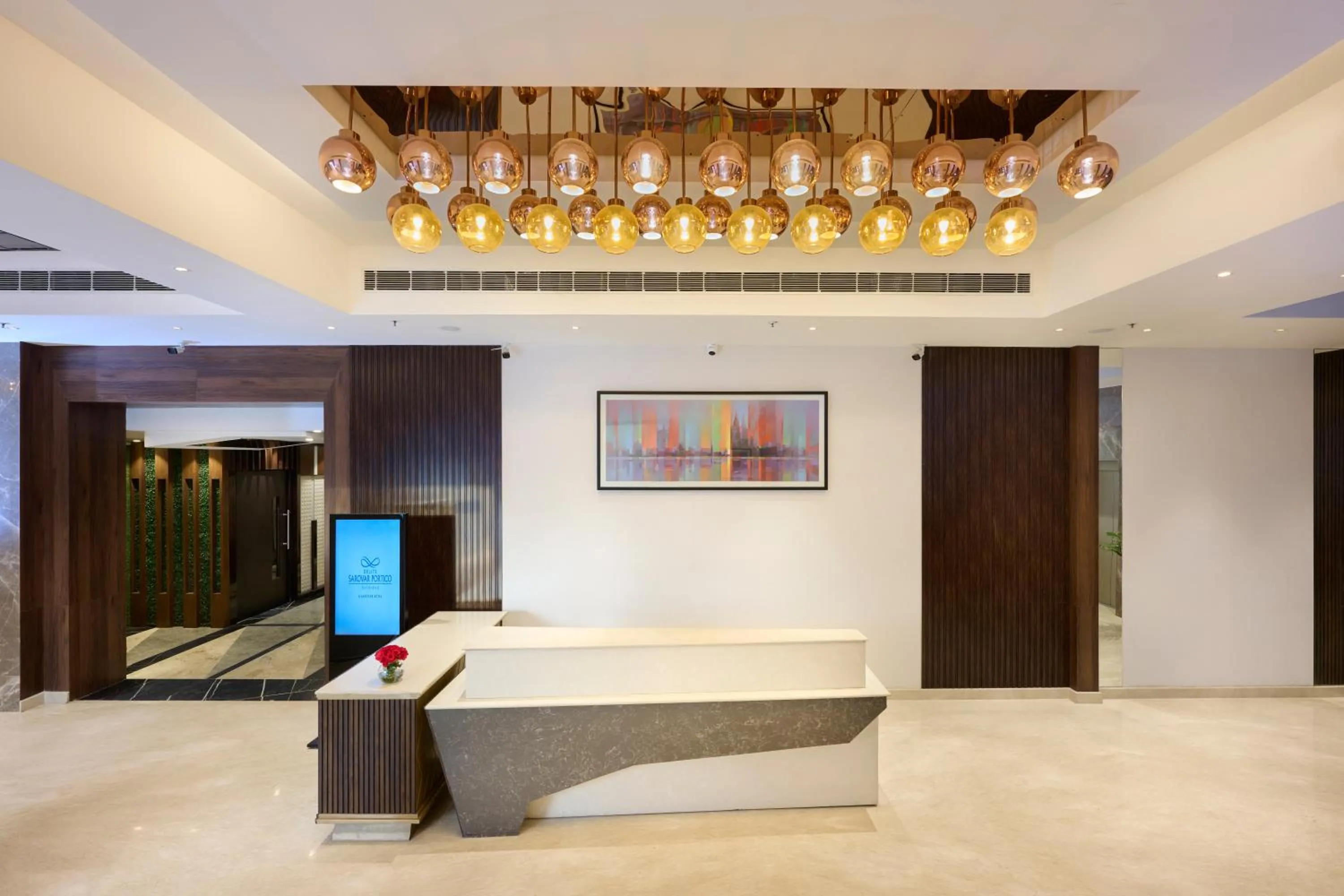 Lobby or reception in Delite Sarovar Portico Faridabad