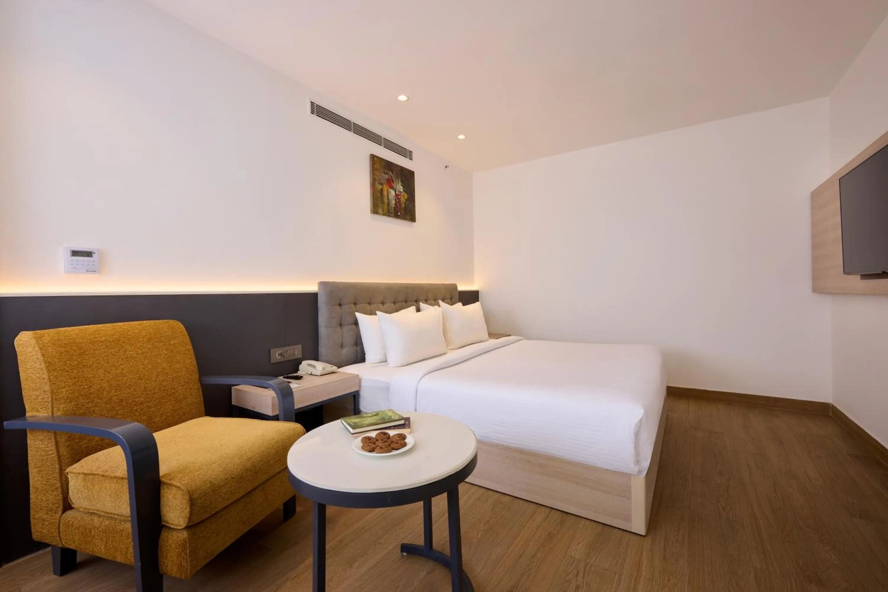 Bed in Delite Sarovar Portico Faridabad