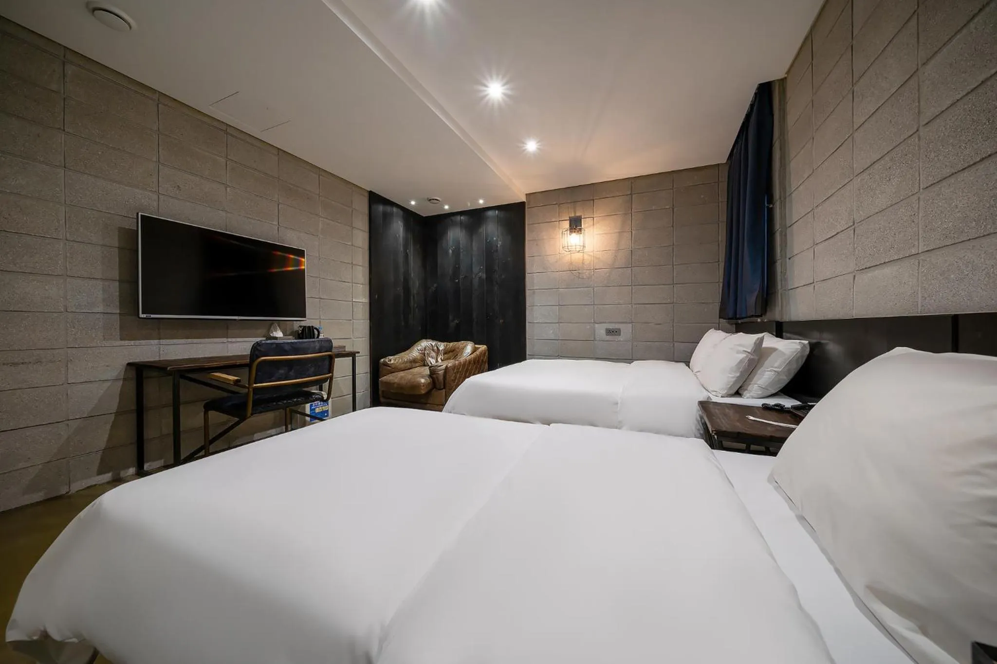 Bed in Hotel The Designers Kondae