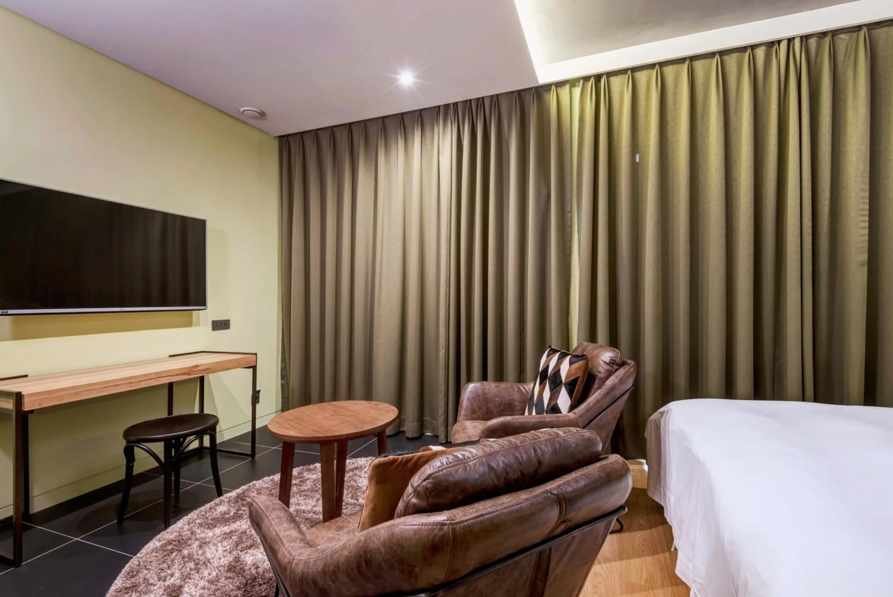 Bed in Hotel The Designers Kondae