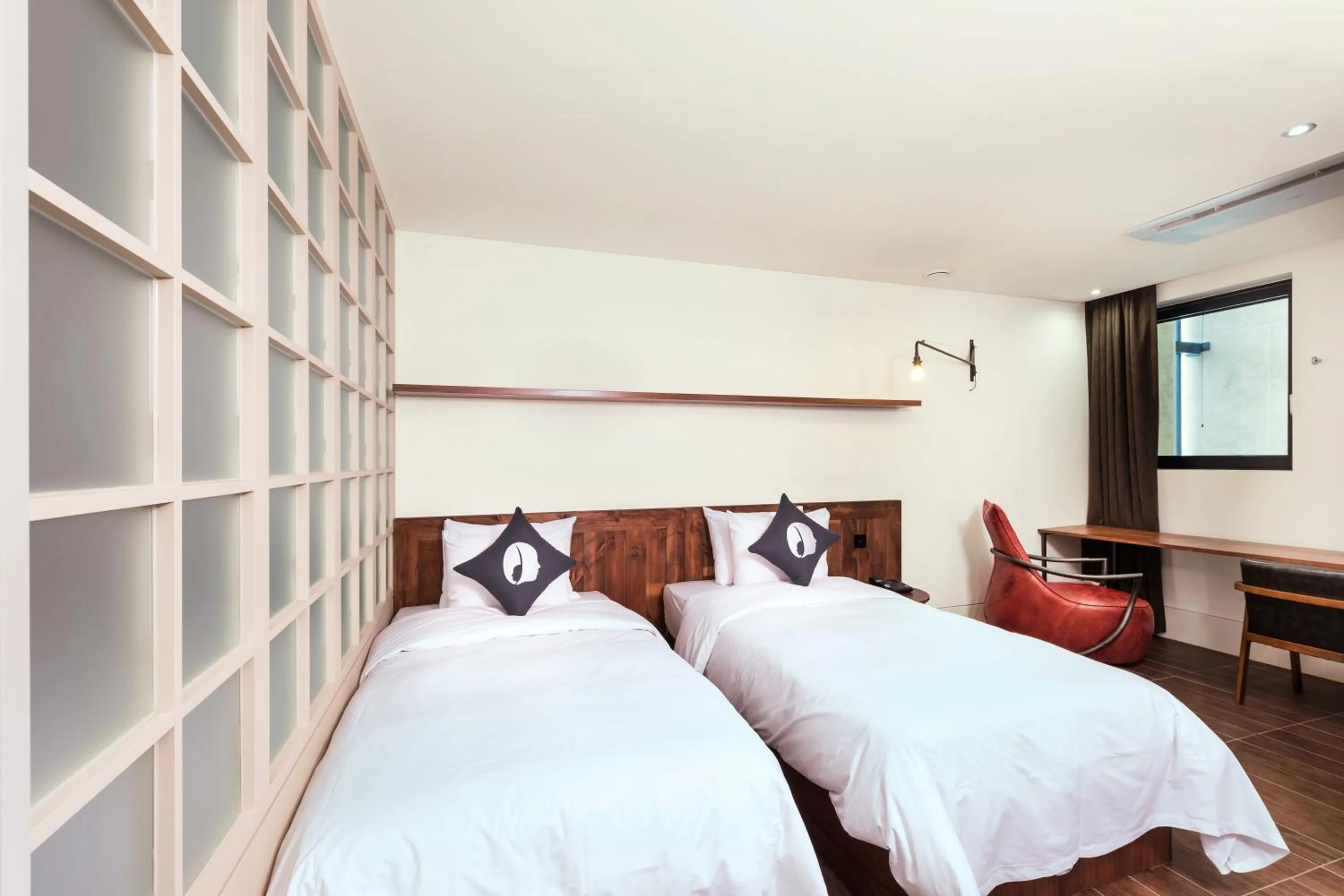 Bed in Hotel The Designers Kondae