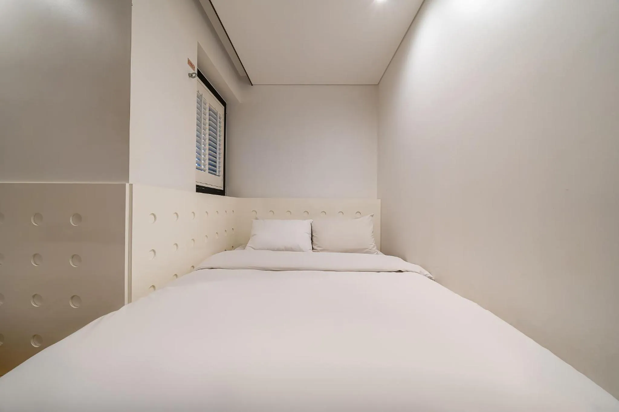 Bed in Hotel The Designers Kondae