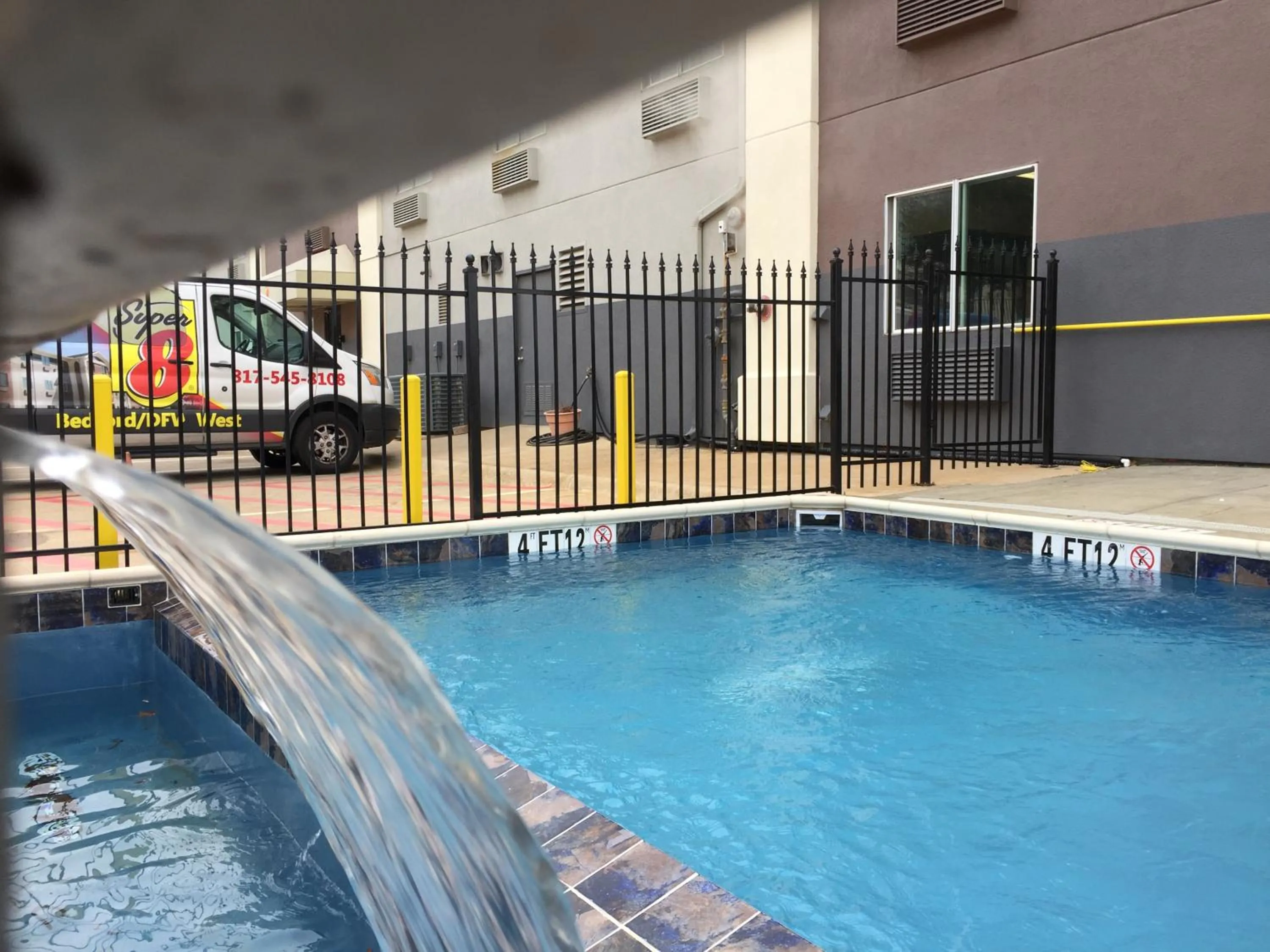 Swimming pool in Super 8 by Wyndham Bedford DFW Airport West