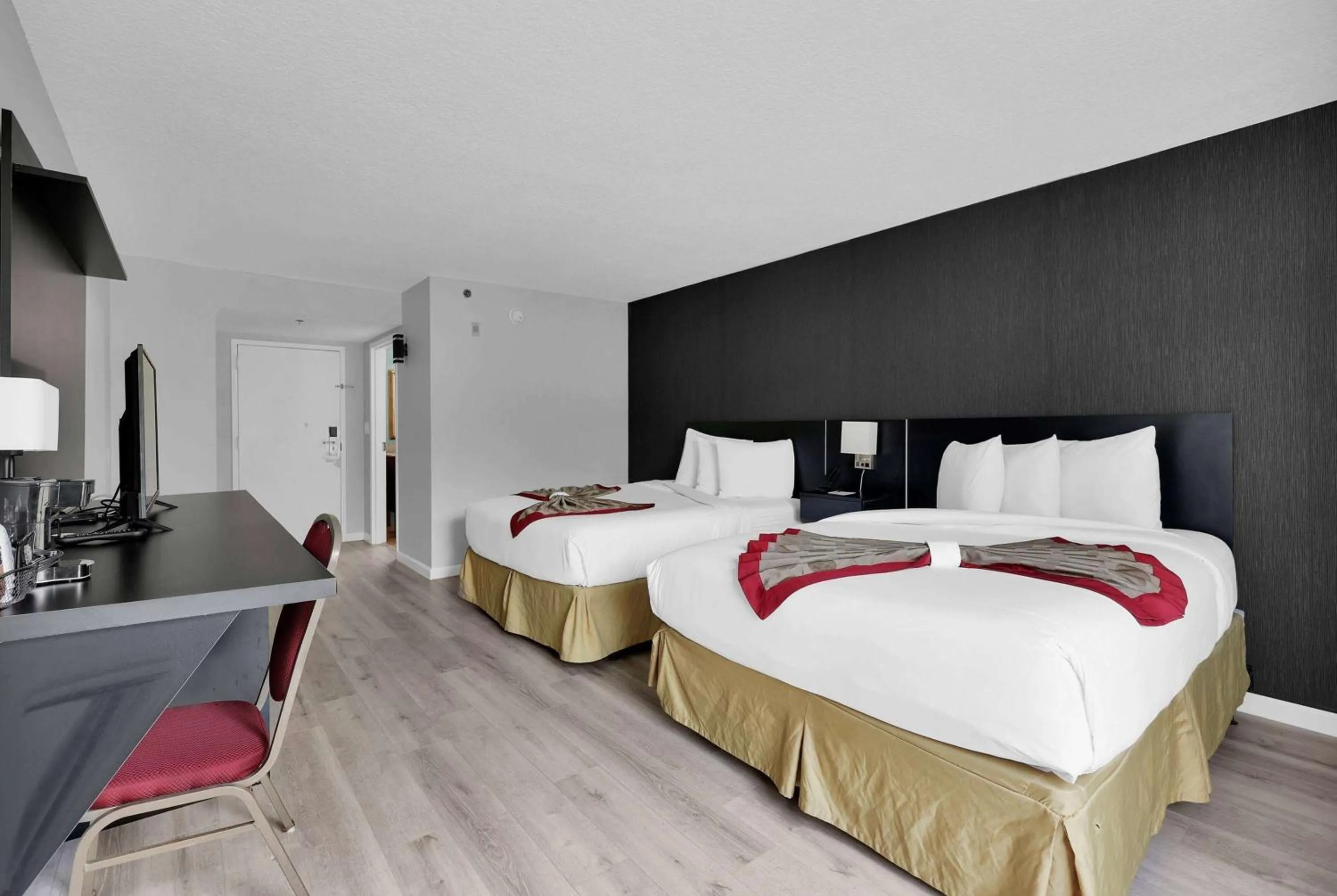 Photo of the whole room, Bed in Ramada by Wyndham Jacksonville I-95 by Butler Blvd