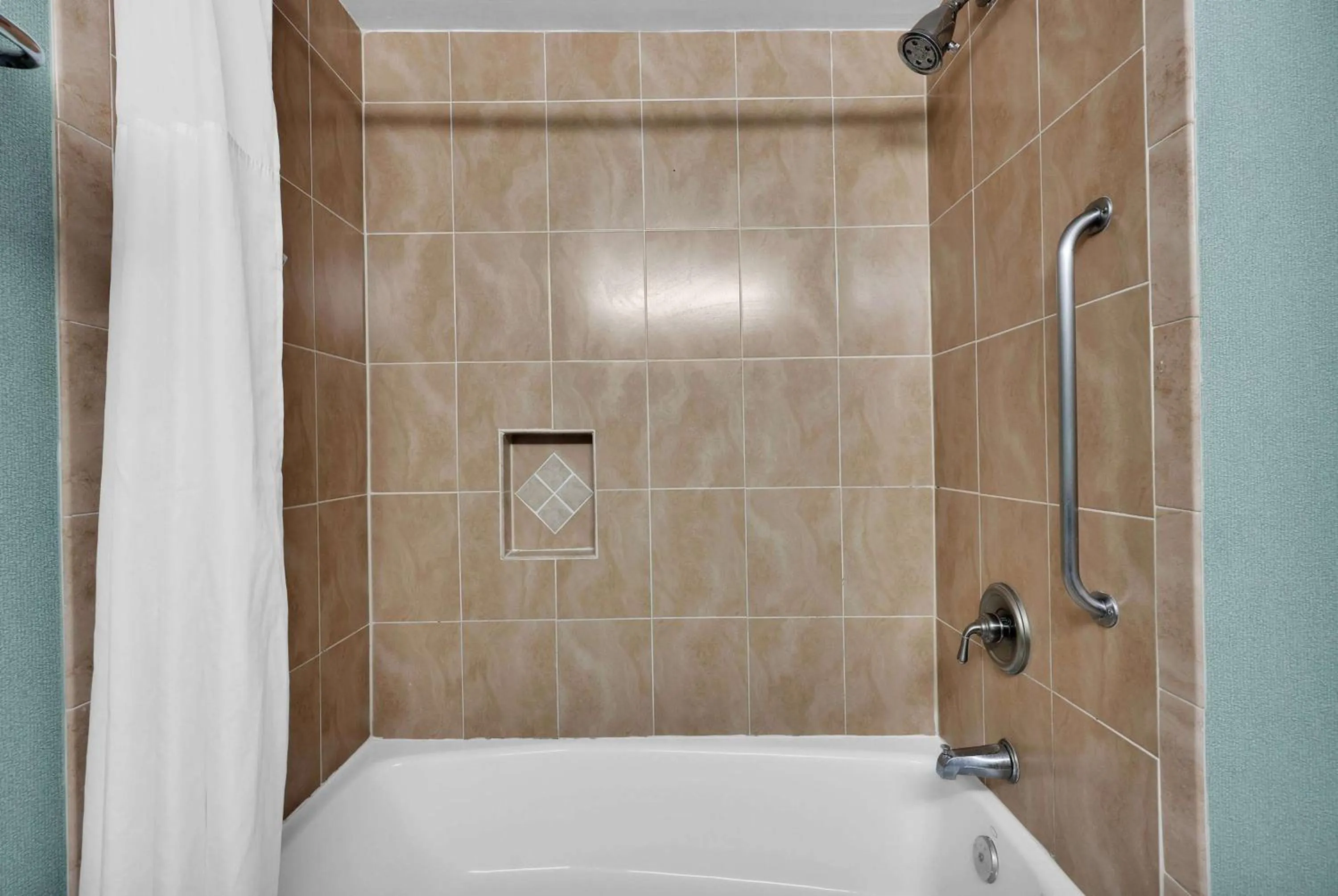 TV and multimedia in Ramada by Wyndham Jacksonville I-95 by Butler Blvd