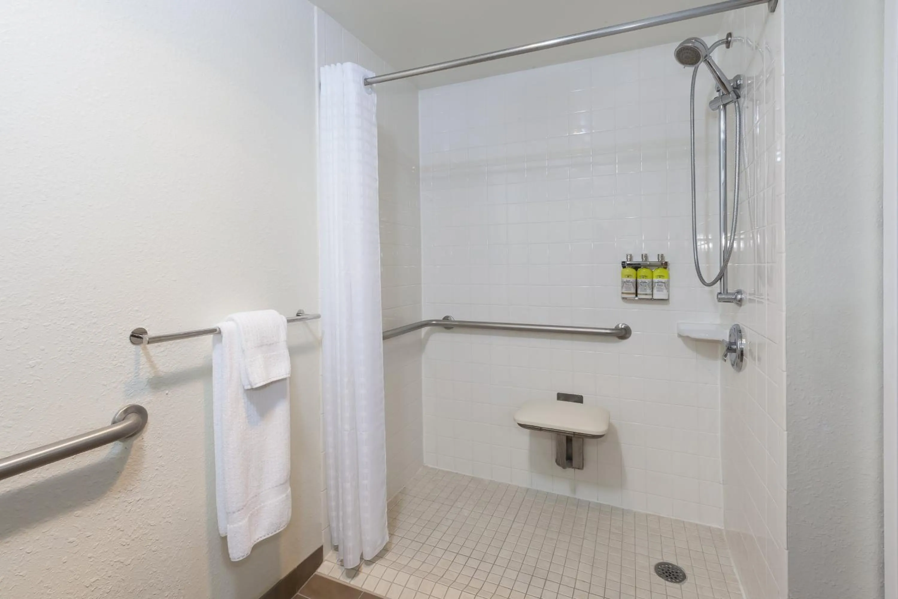 Bathroom in Candlewood Suites Grand Rapids Airport by IHG