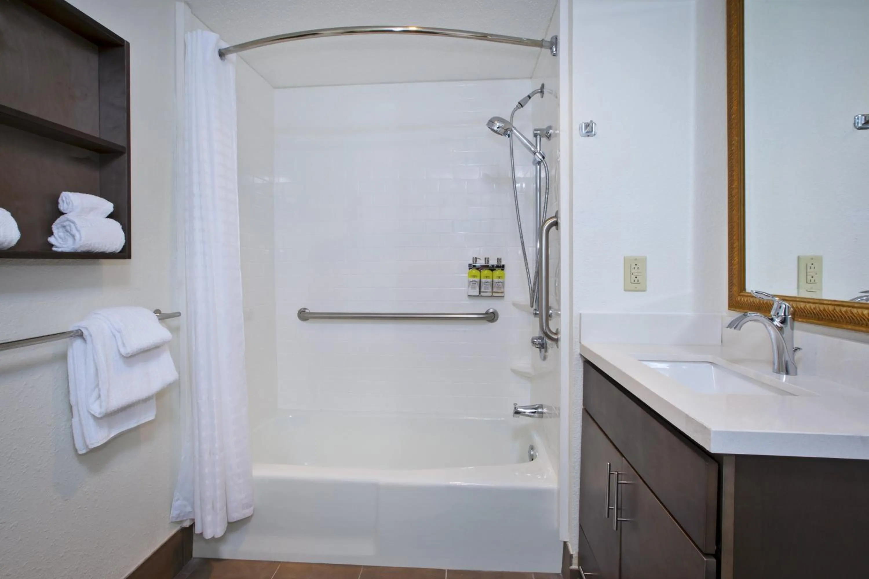 Bathroom in Candlewood Suites Grand Rapids Airport by IHG