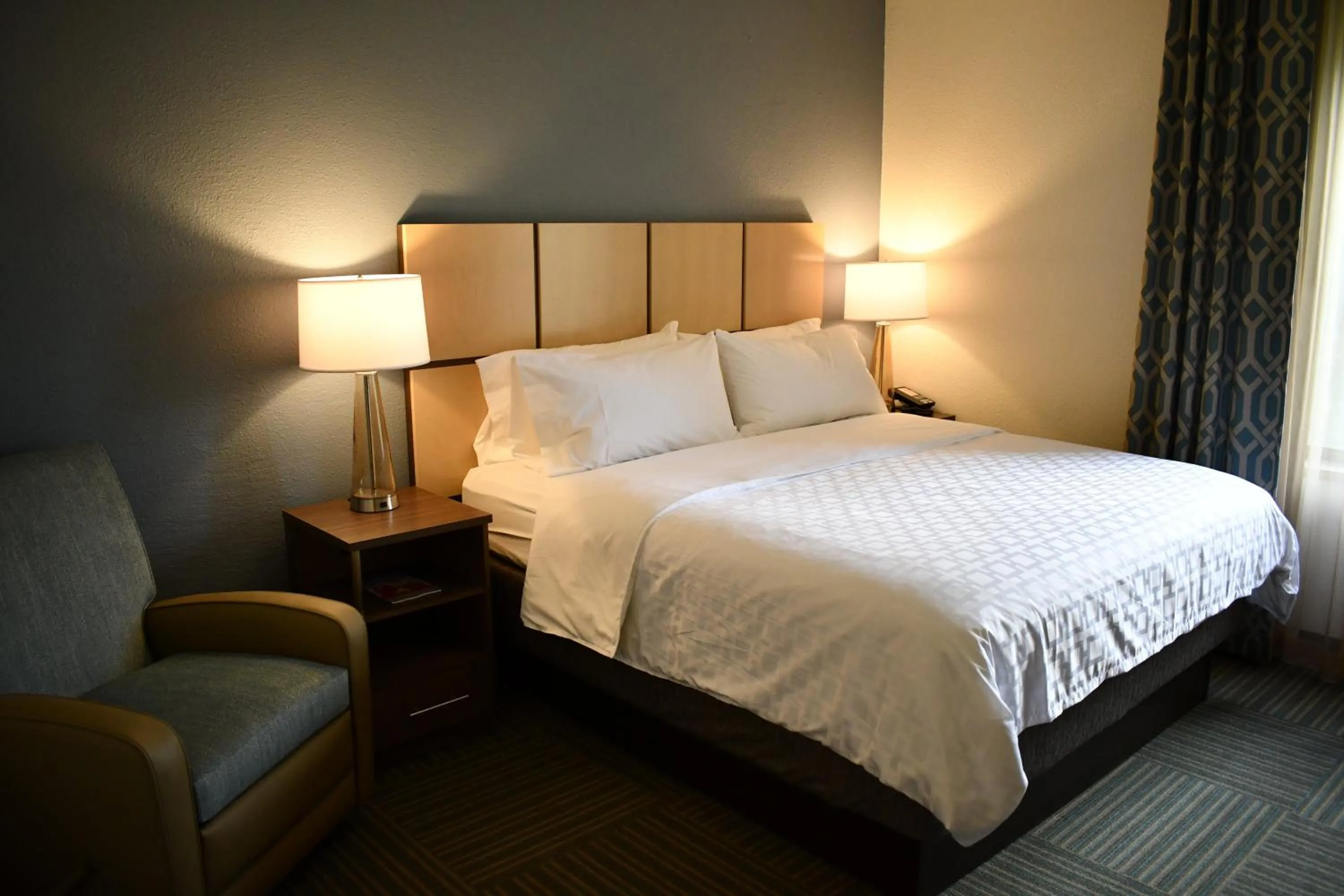 Photo of the whole room, Bed in Candlewood Suites Grand Rapids Airport by IHG