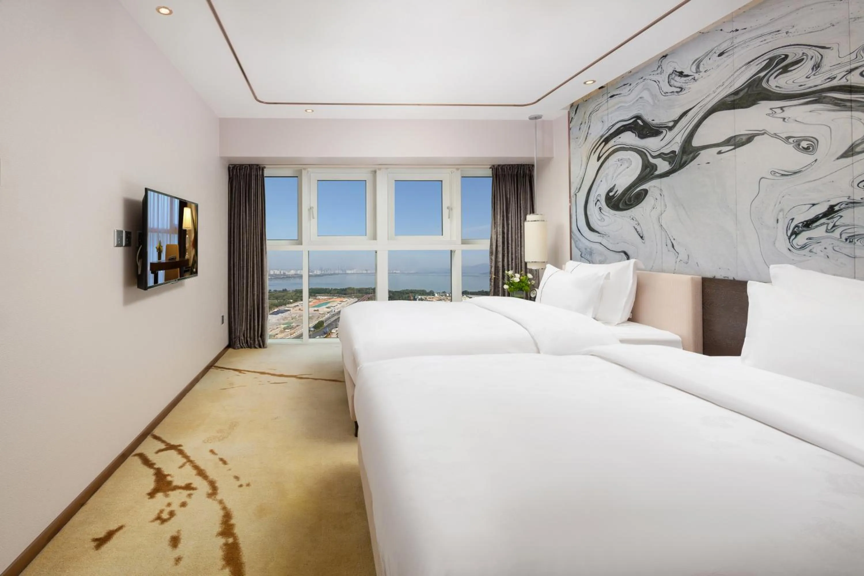 Bed in Shenzhen Bay Hisoar Hotel