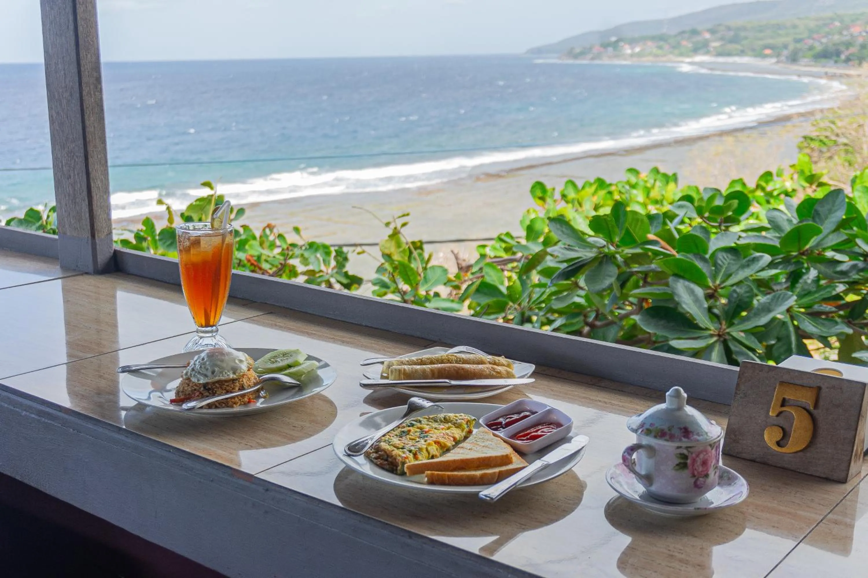 Day in Manta Cottages with Sea View