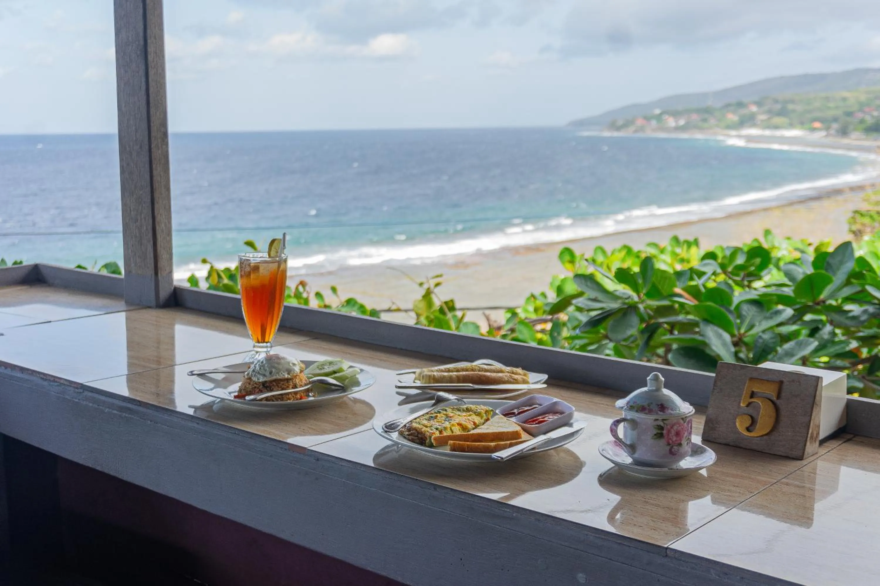 Day in Manta Cottages with Sea View