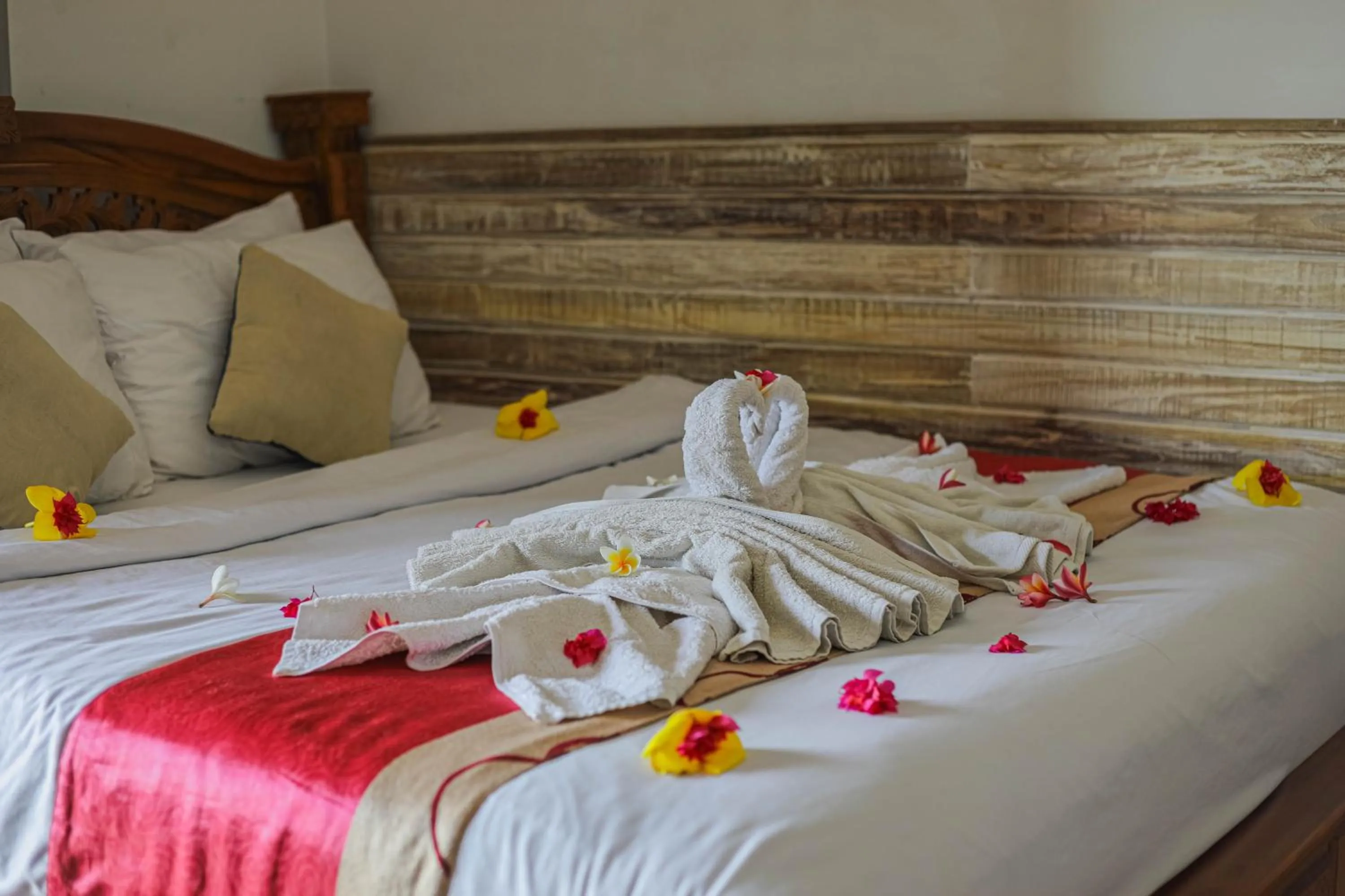 Bed in Manta Cottages with Sea View