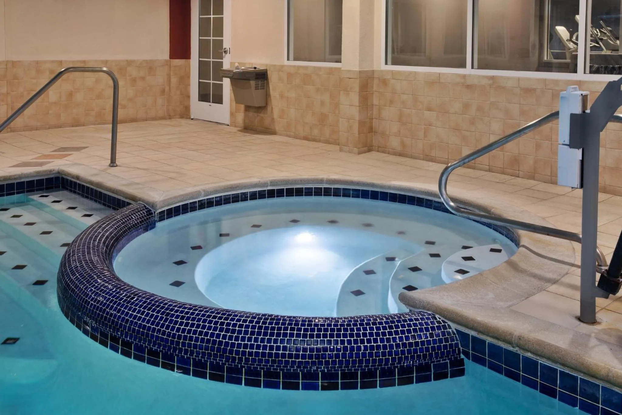 Swimming pool in Holiday Inn Express Hotel & Suites Grand Rapids-North by IHG