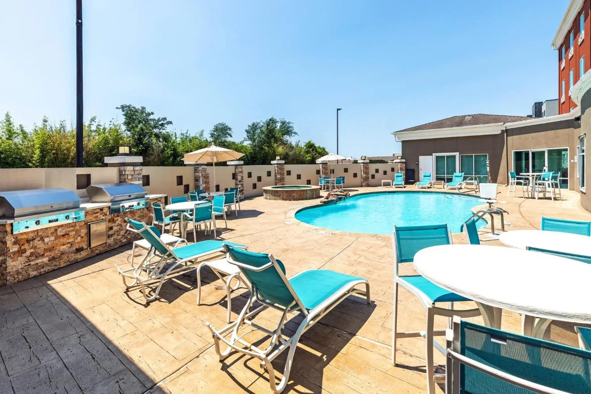 Swimming pool in Holiday Inn Express Houston Space Center-Clear Lake by IHG Swimming pool in Holiday Inn Express Houston Space Center-Clear Lake by IHG