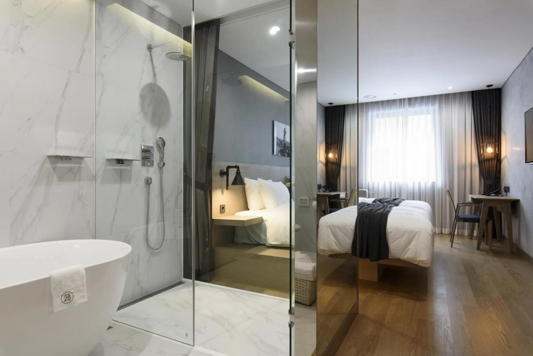 Bathroom, Bed in Hotel28 Myeongdong