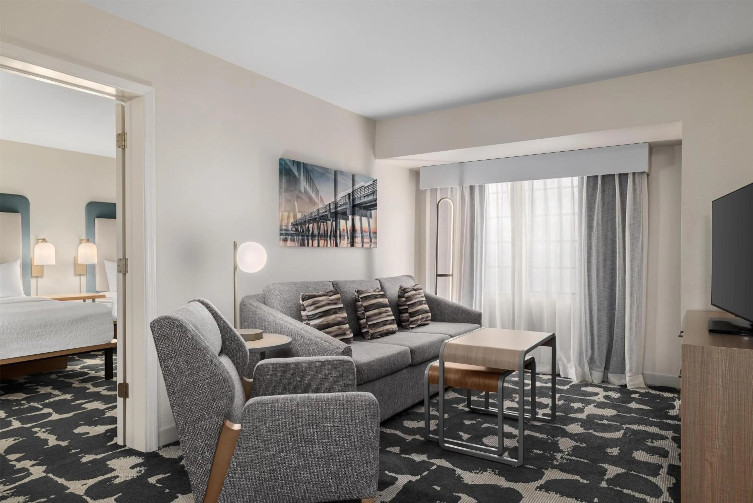 Living room, Bed in Homewood Suites Jacksonville Deerwood Park