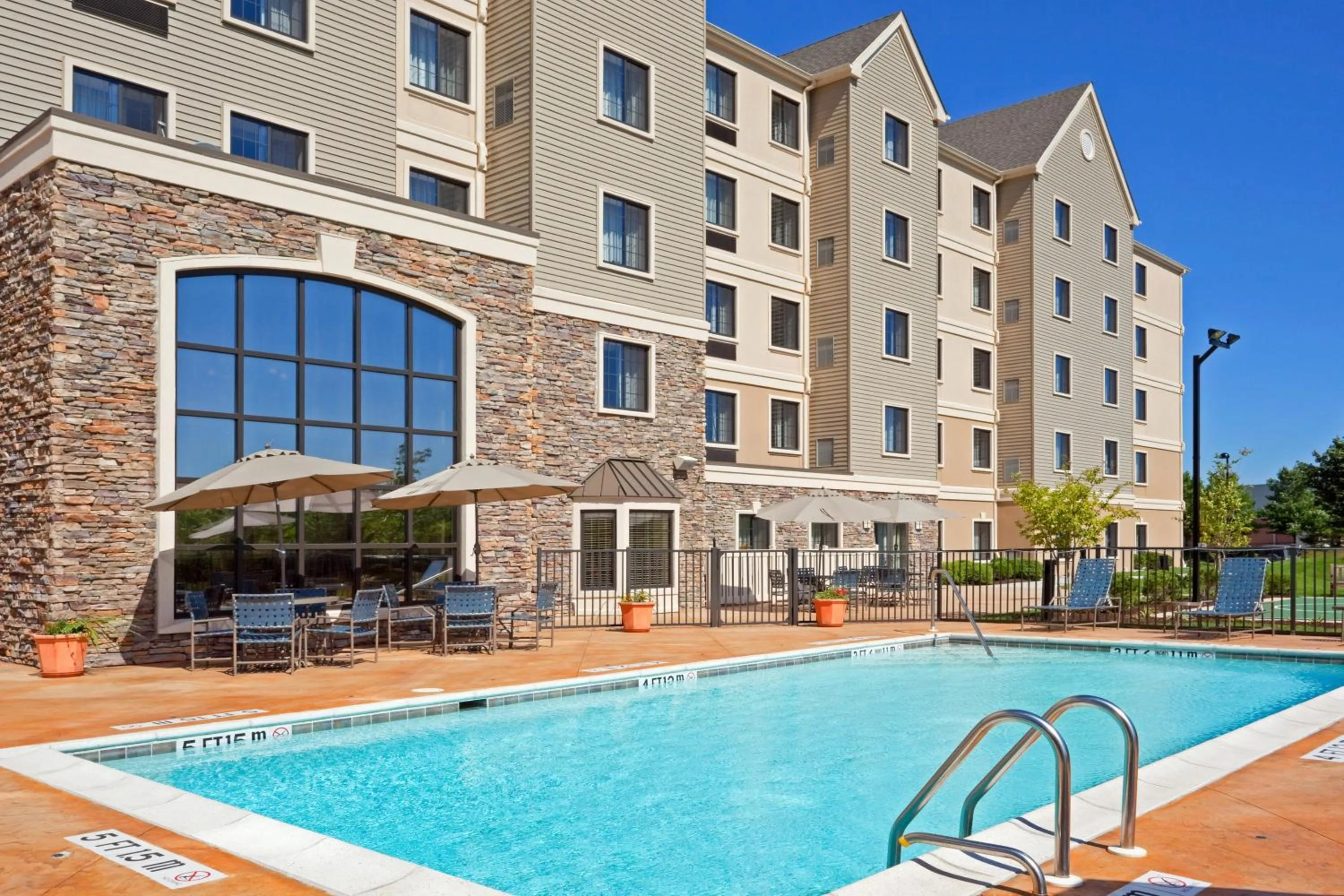 Swimming pool in Staybridge Suites Wilmington - Brandywine Valley by IHG