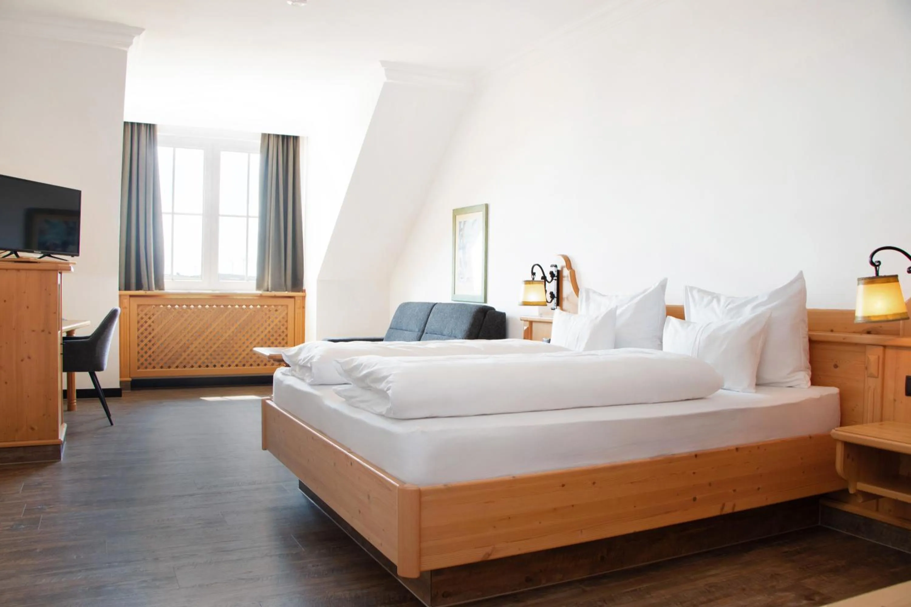 Bed in Self-Check-in Hotel VinoQ Mistelbach