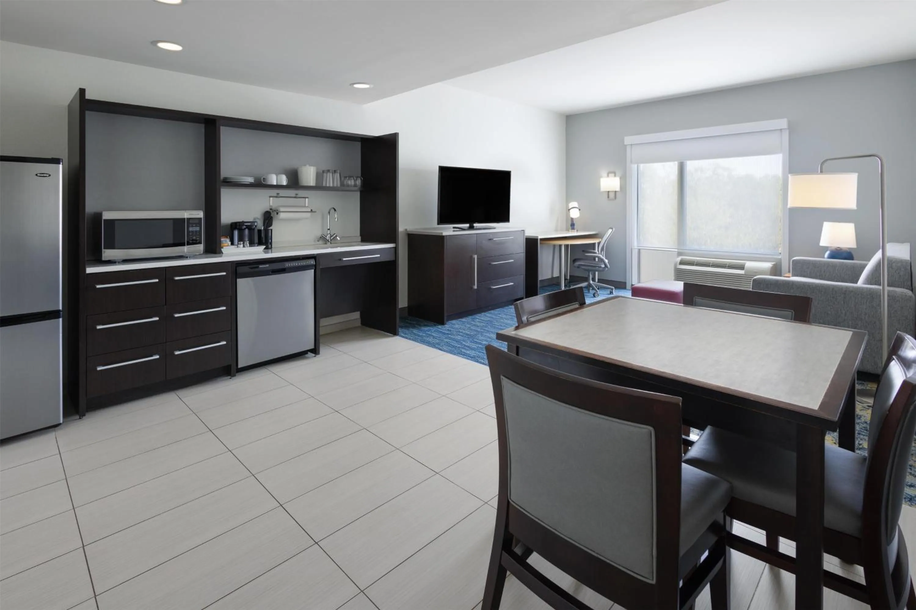 Living room in Home2 Suites by Hilton Greenville Downtown