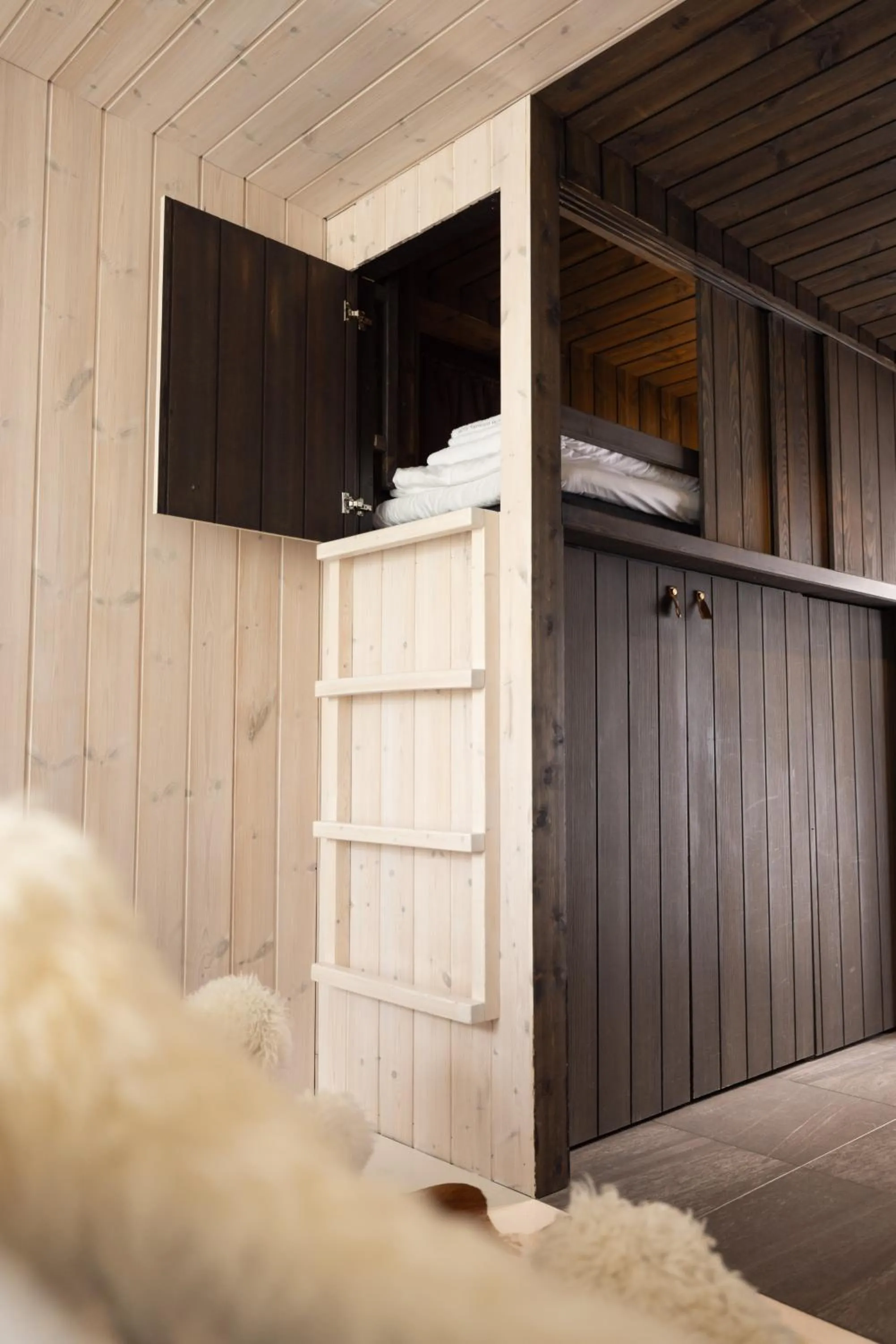 Bed in Arctic TreeHouse Hotel