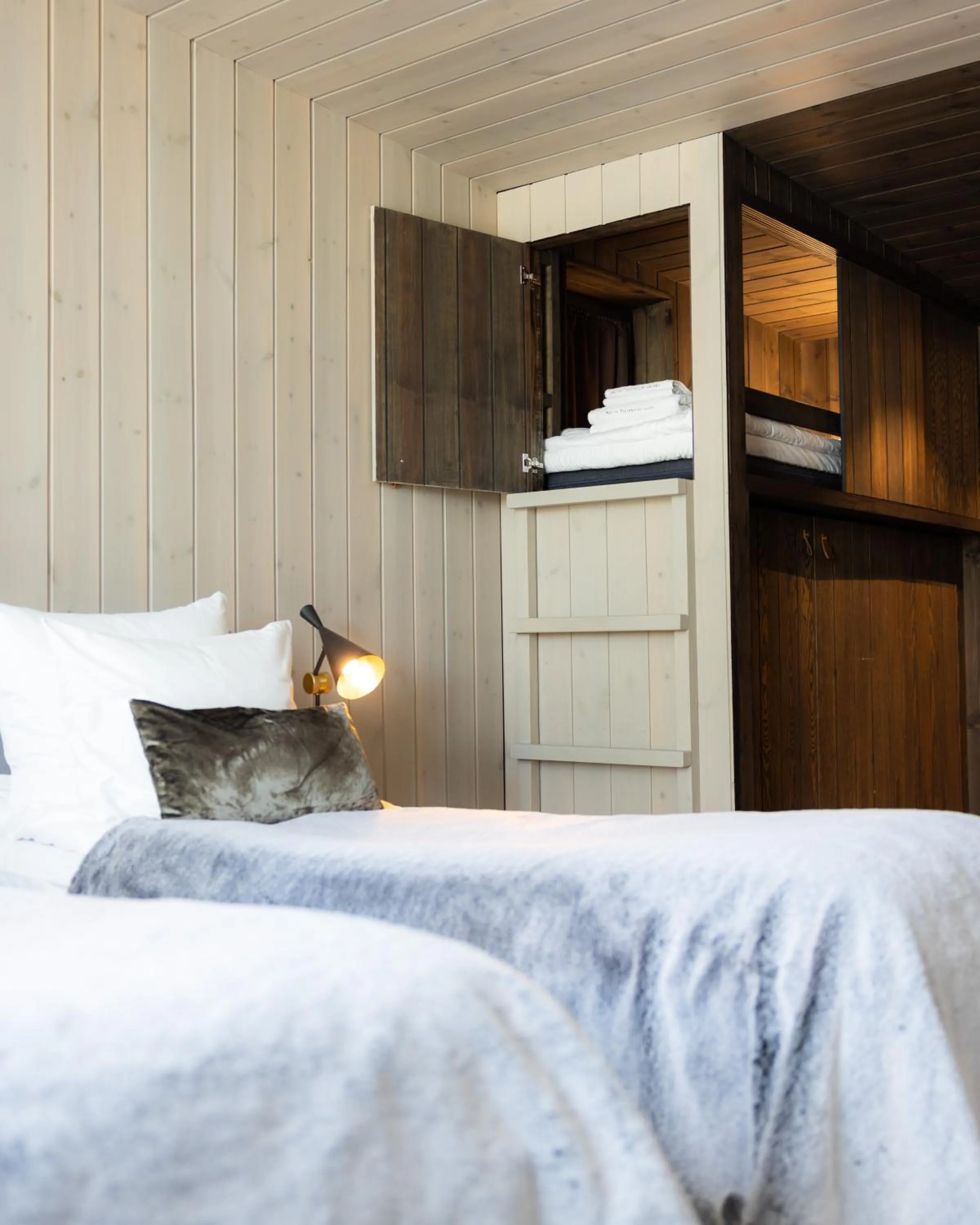 Bed in Arctic TreeHouse Hotel