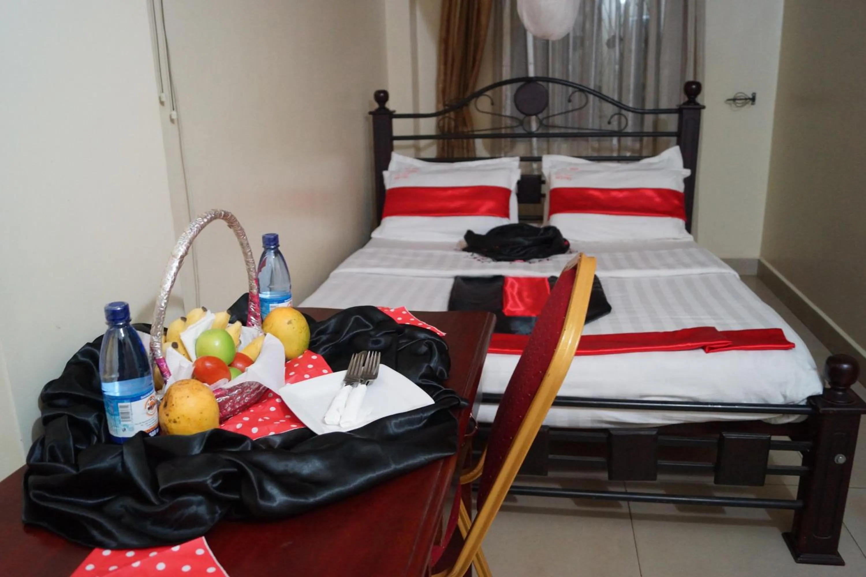 Bedroom in KK Trust Hotel Kampala