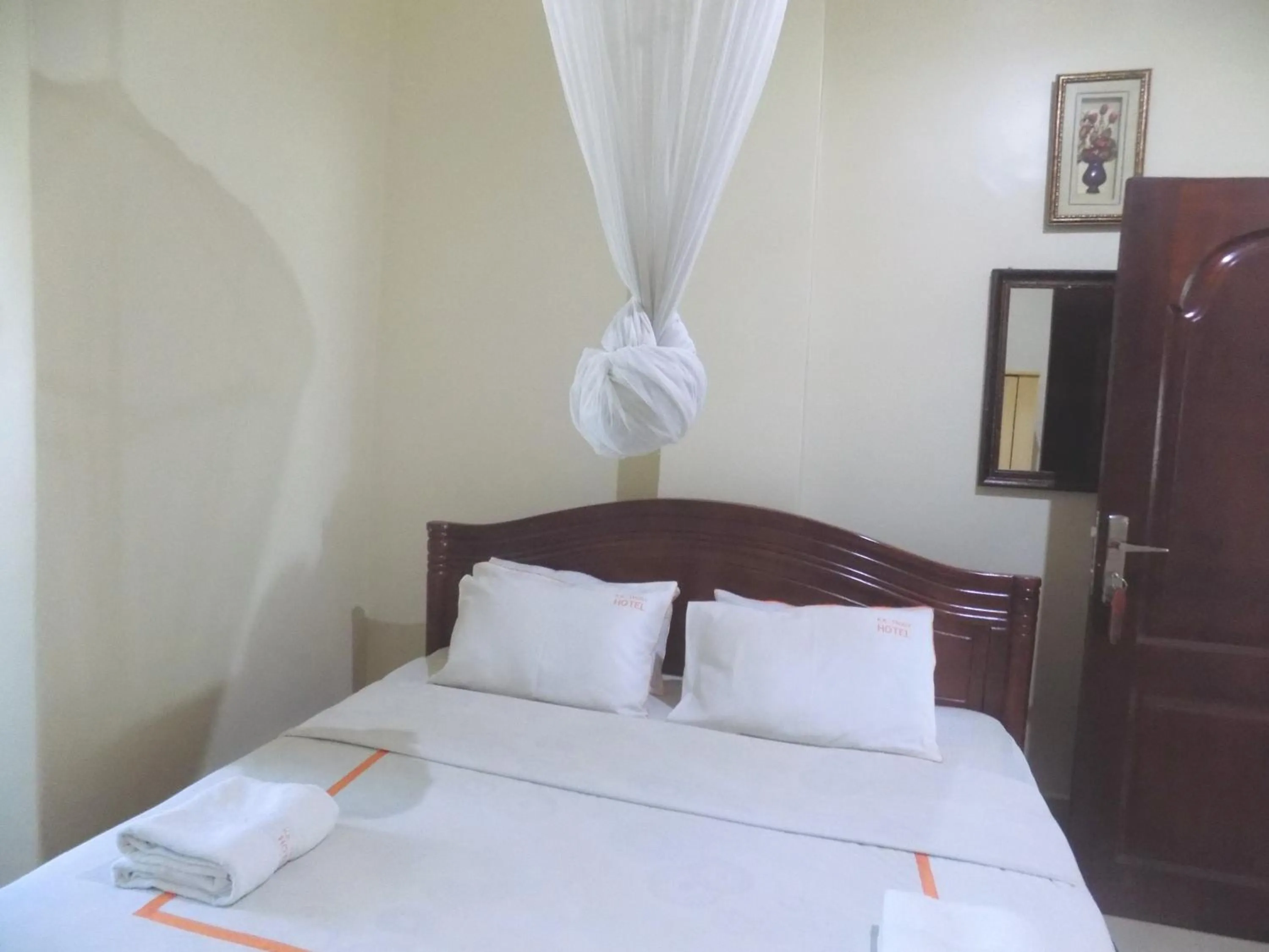 Bedroom in KK Trust Hotel Kampala