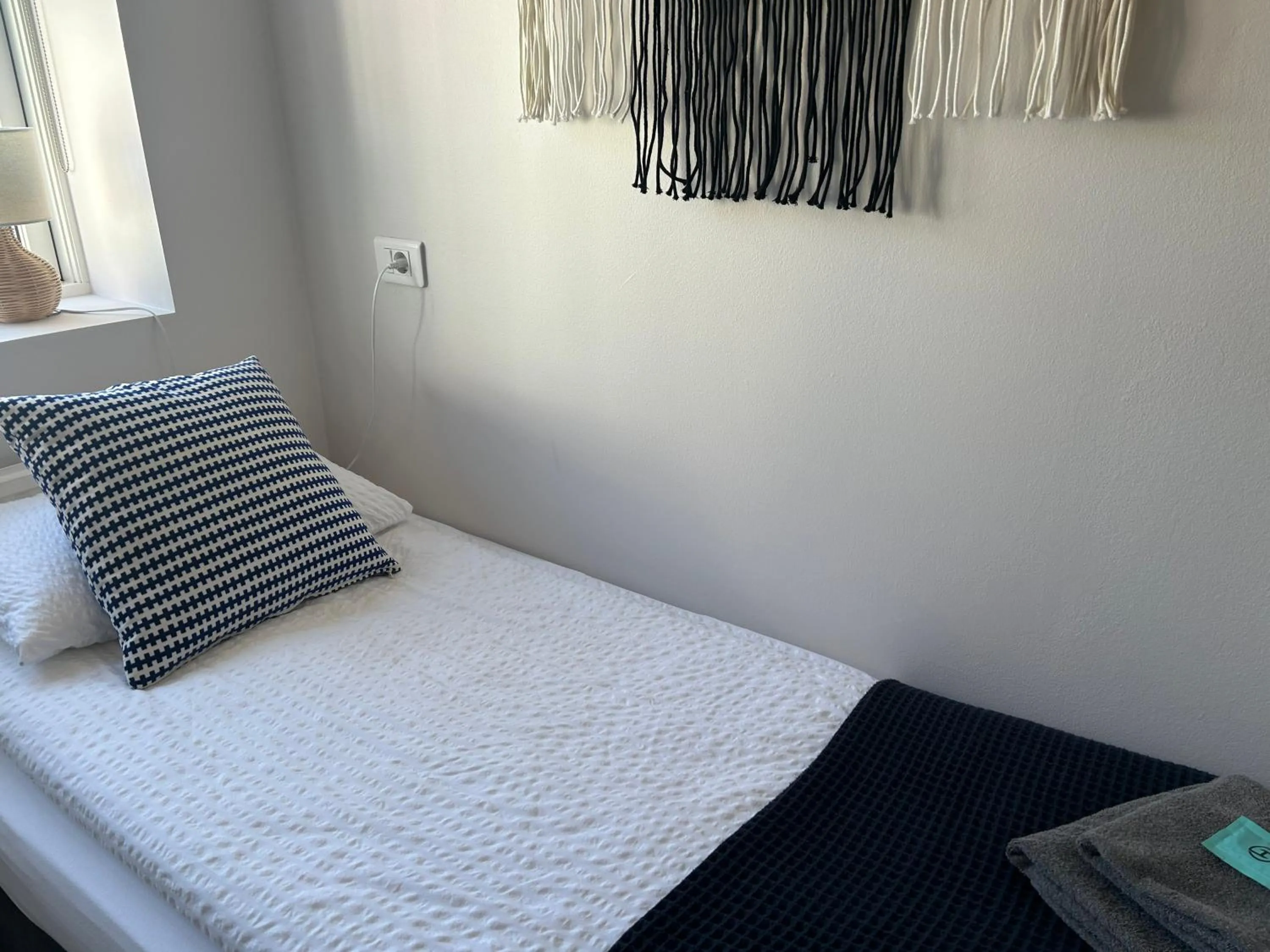 Bed in Lindartún Guesthouse