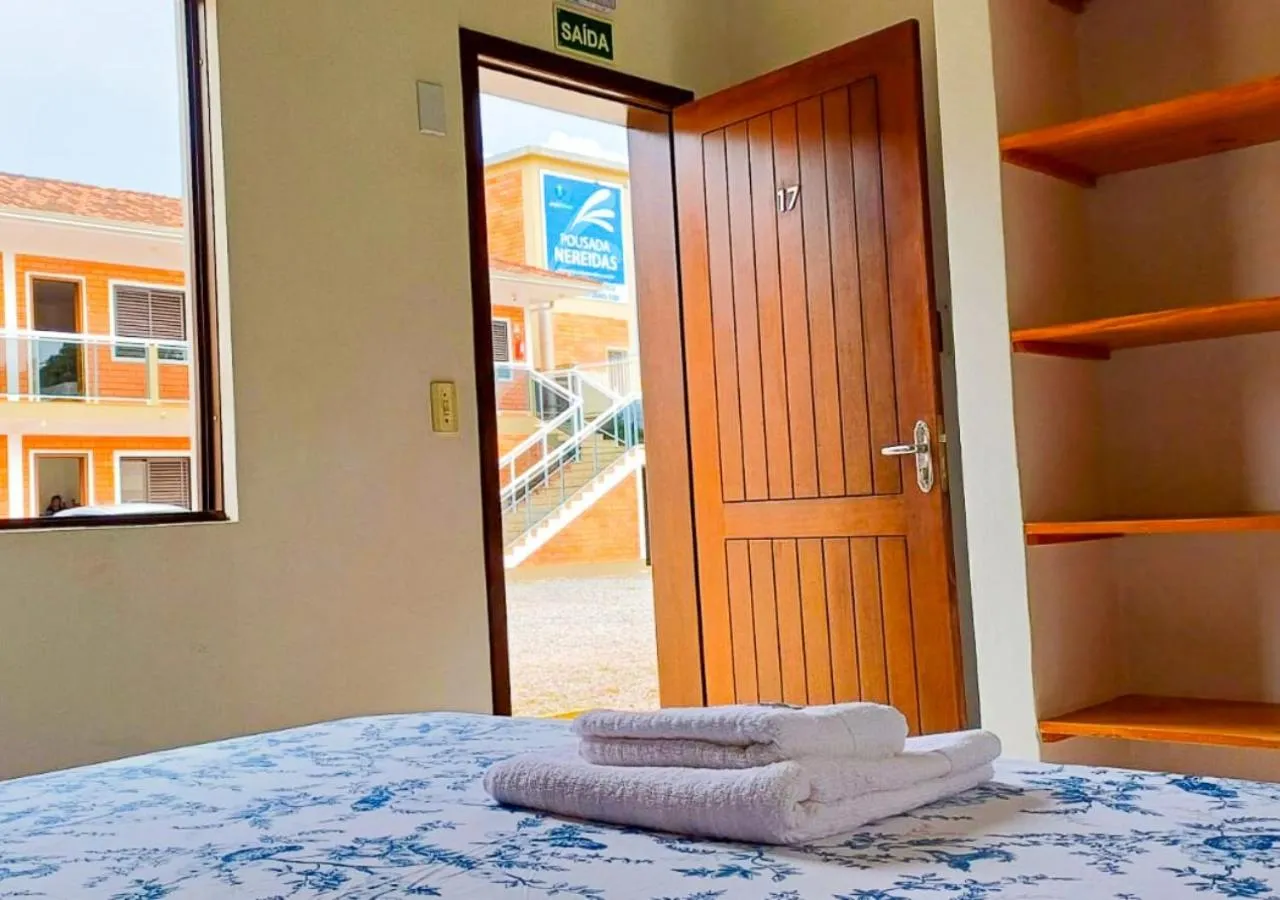 Bed in Pousada Nereidas