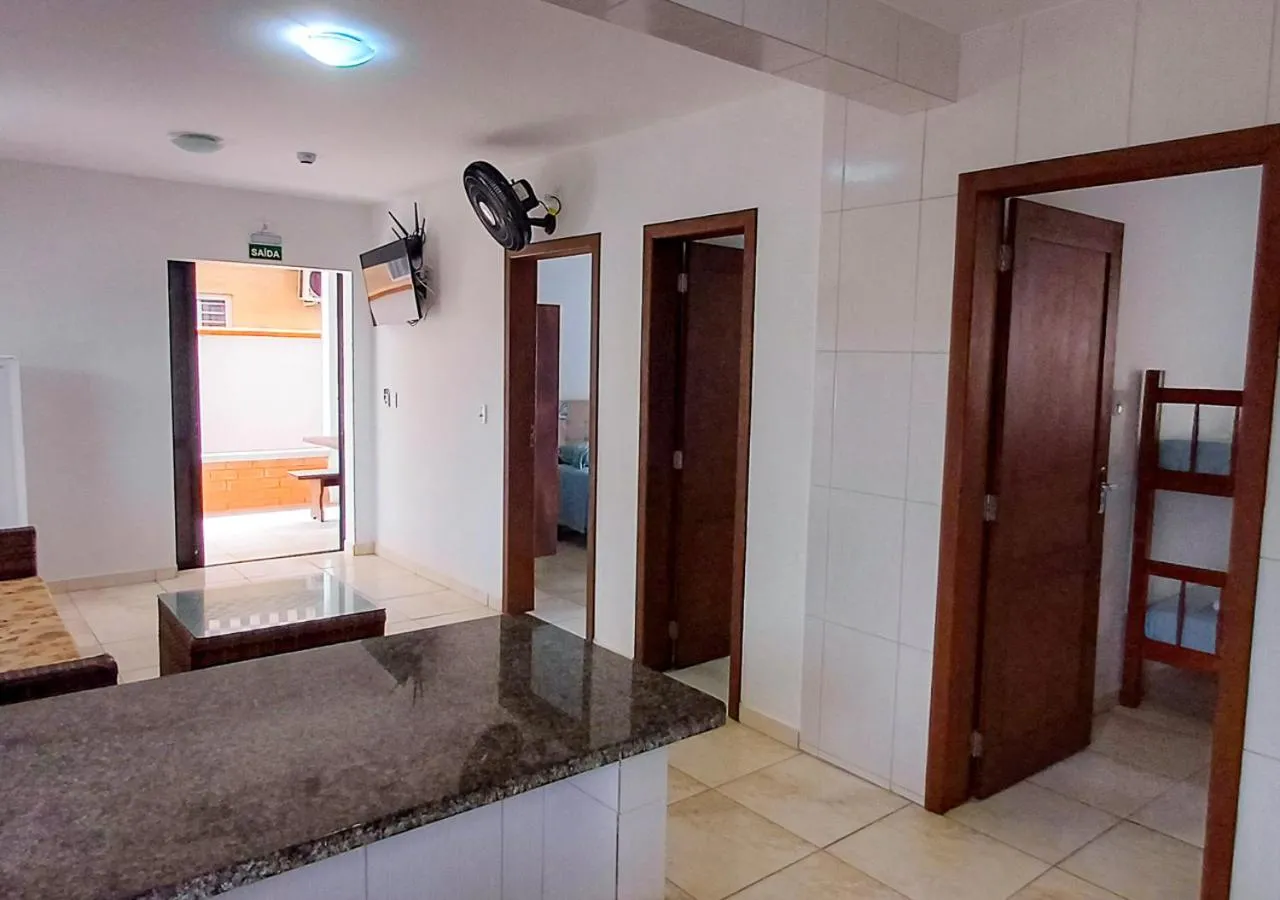 Kitchen or kitchenette, Bed in Pousada Nereidas