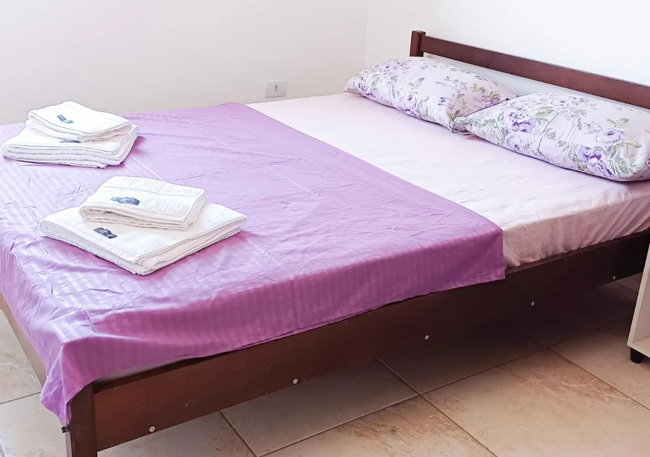 Bed in Pousada Nereidas