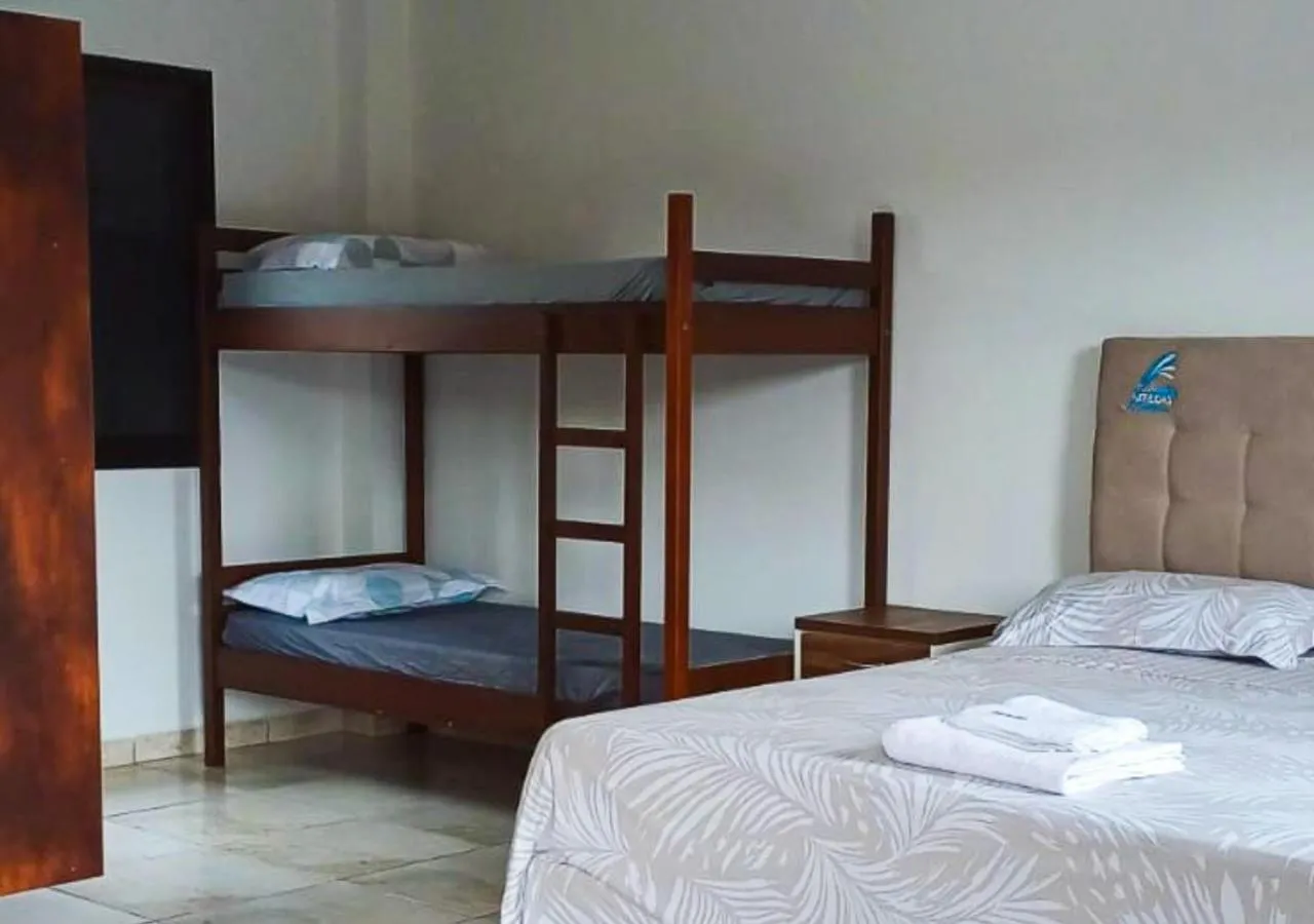 Bed in Pousada Nereidas